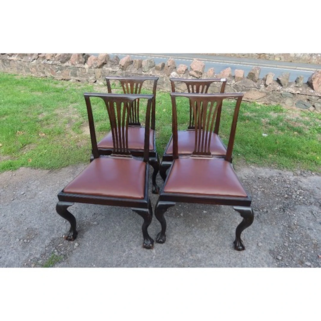 A set of four 19th century dining chairs, with pierced splat