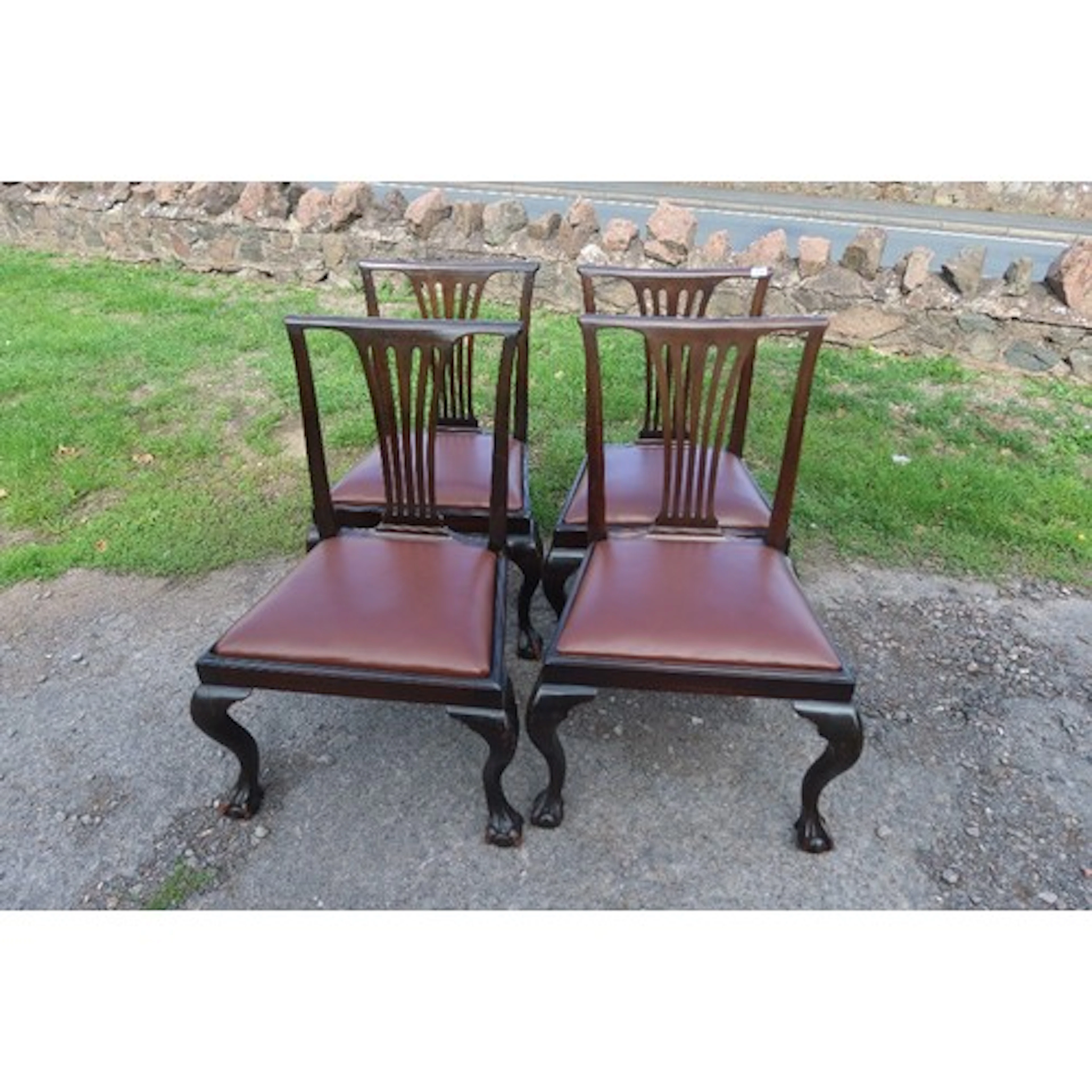 A set of four 19th century dining chairs, with pierced splat