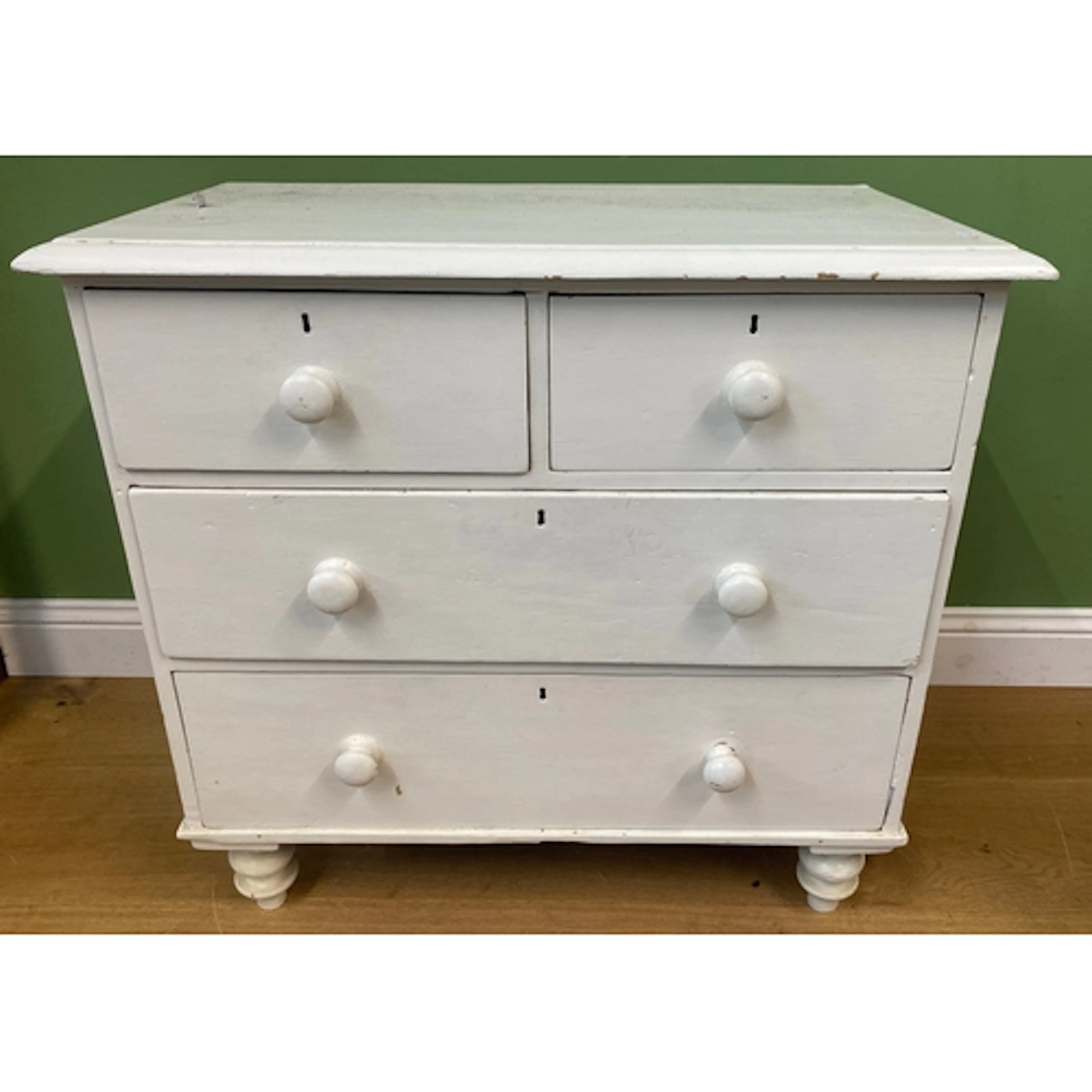 A Victorian pine white painted chest of two short over two l...