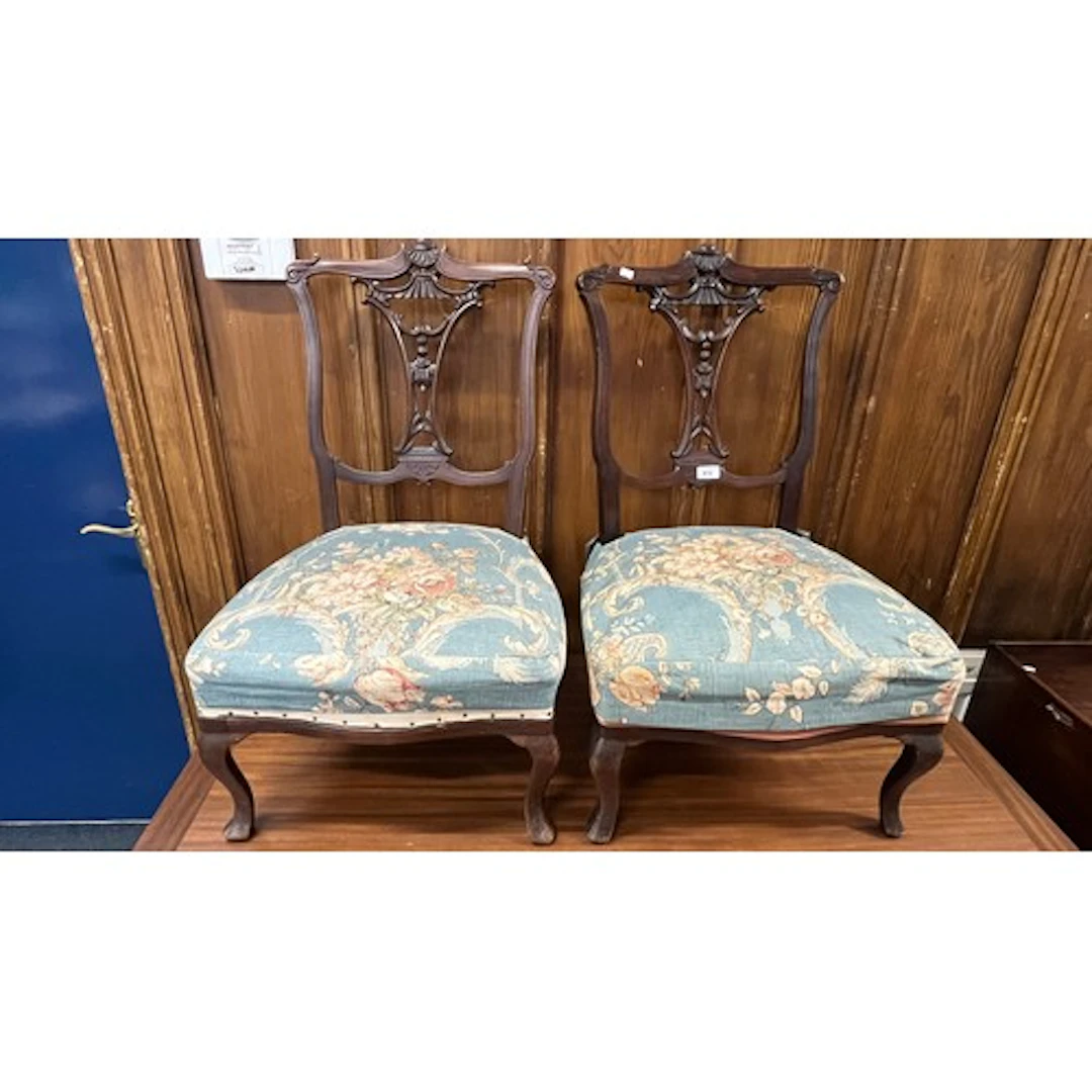 Pair of mahogany carved parlour chairs.
