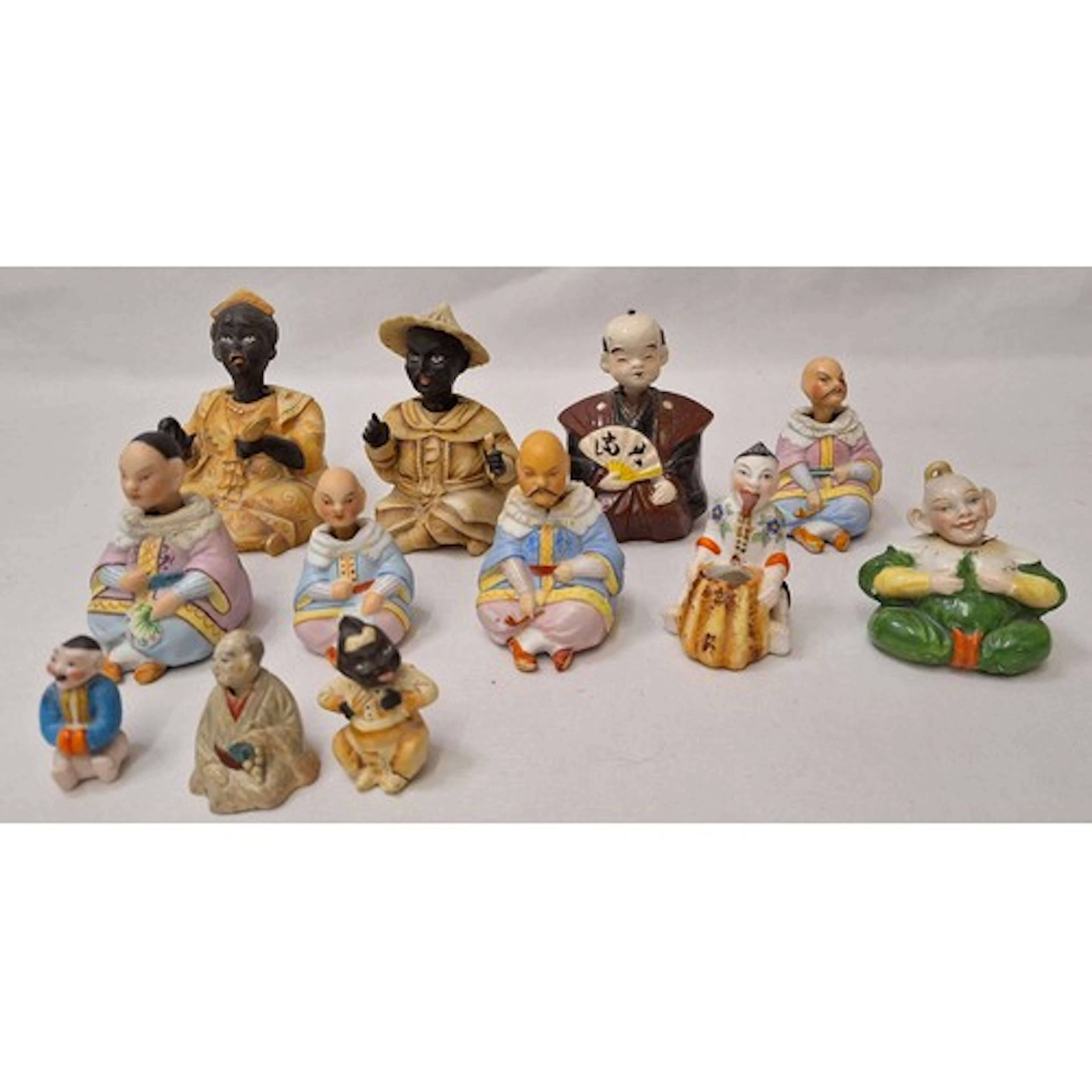 Nodding Head Figurines, all Eastern/Ethnic, 1 with tongue po...