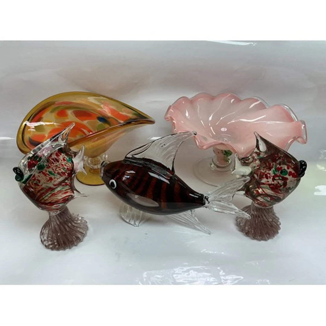 A collection of glassware including Murano style fish, bowls...