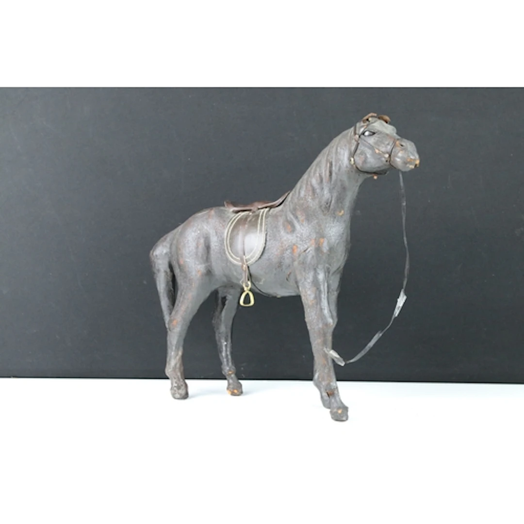 20th century model of a horse, modelled wearing a saddle and...