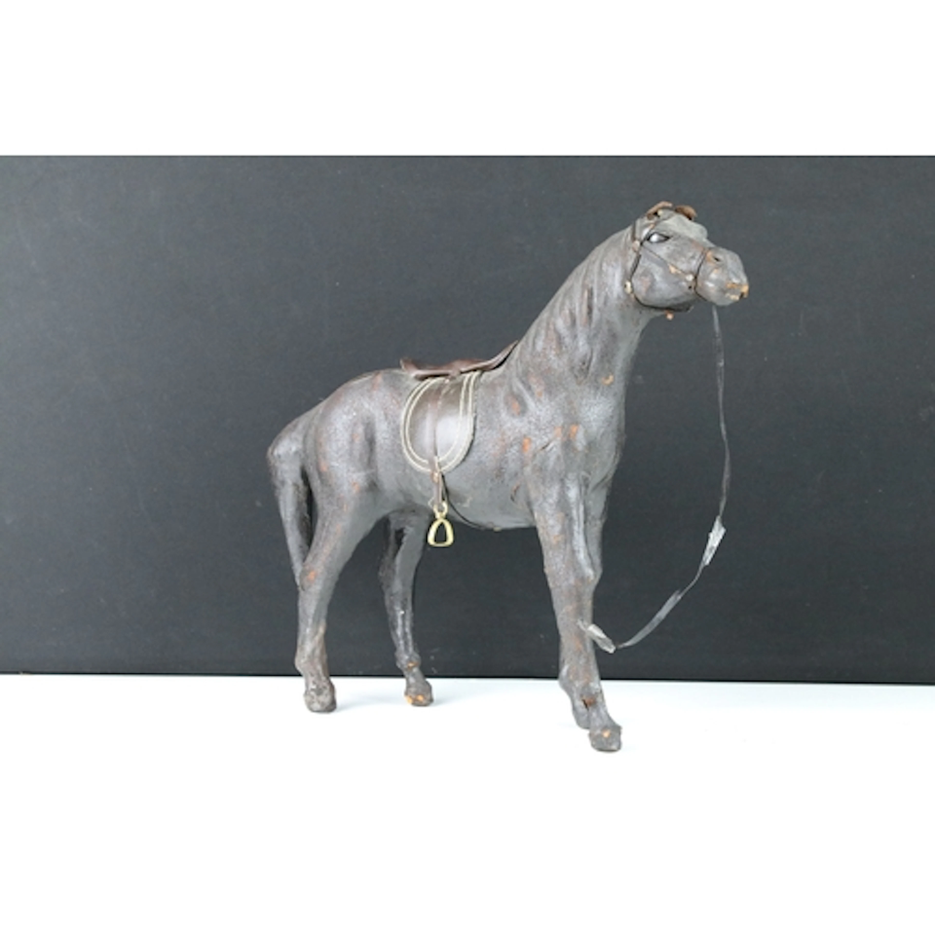 20th century model of a horse, modelled wearing a saddle and...