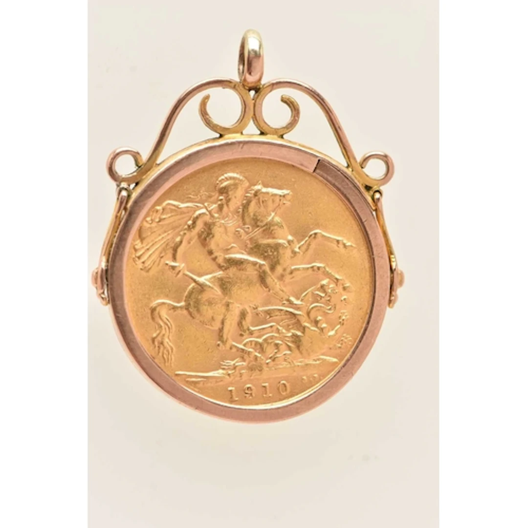 A MOUNTED FULL GOLD SOVEREIGN COIN PENDANT, dated 1910, Edwa...