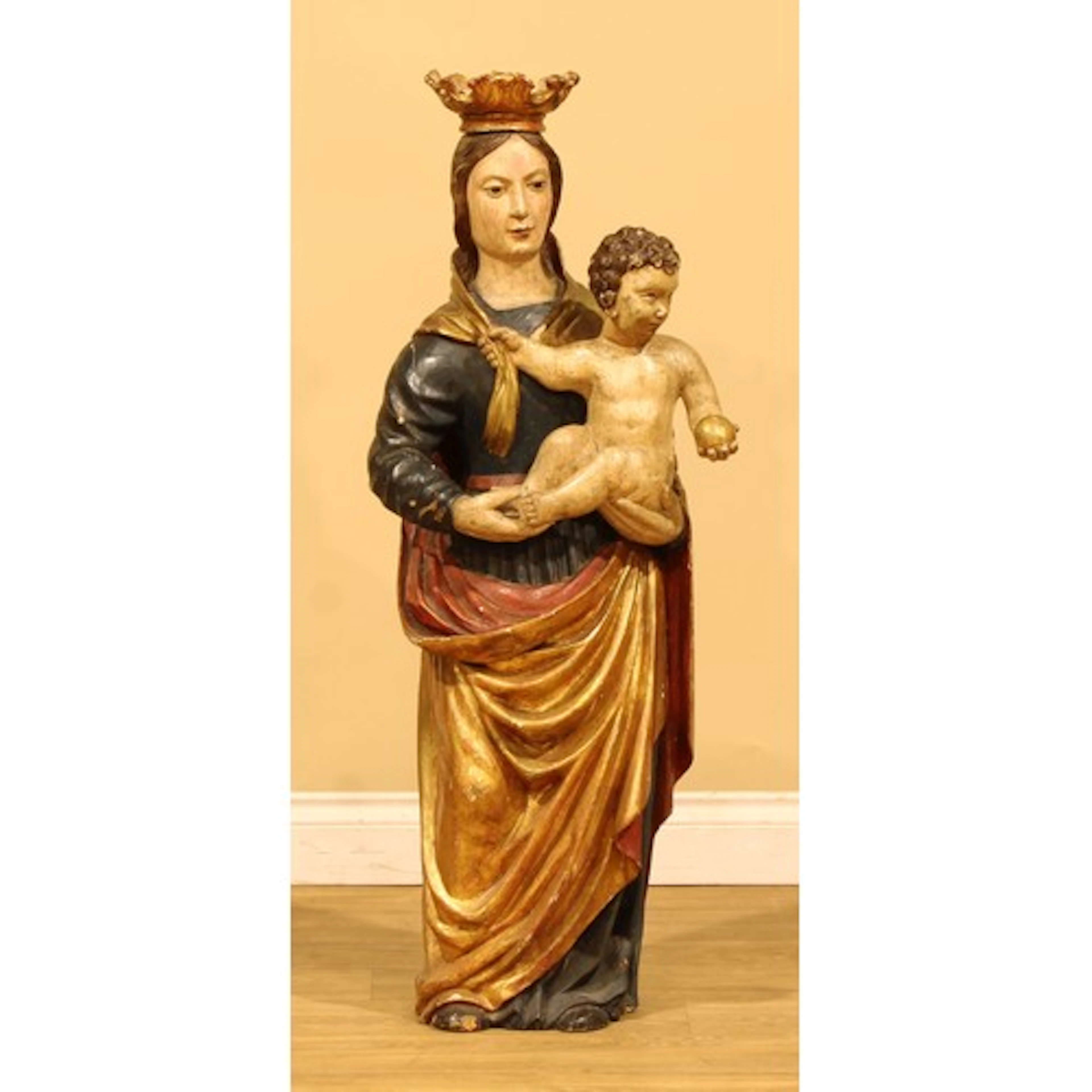 An ecclesiastical polychrome decorated softwood figure, Mado...