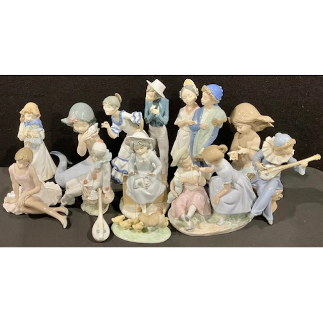 A pair of Nao mermaid figures, numbers 1367 and 1368, 21cm, ...