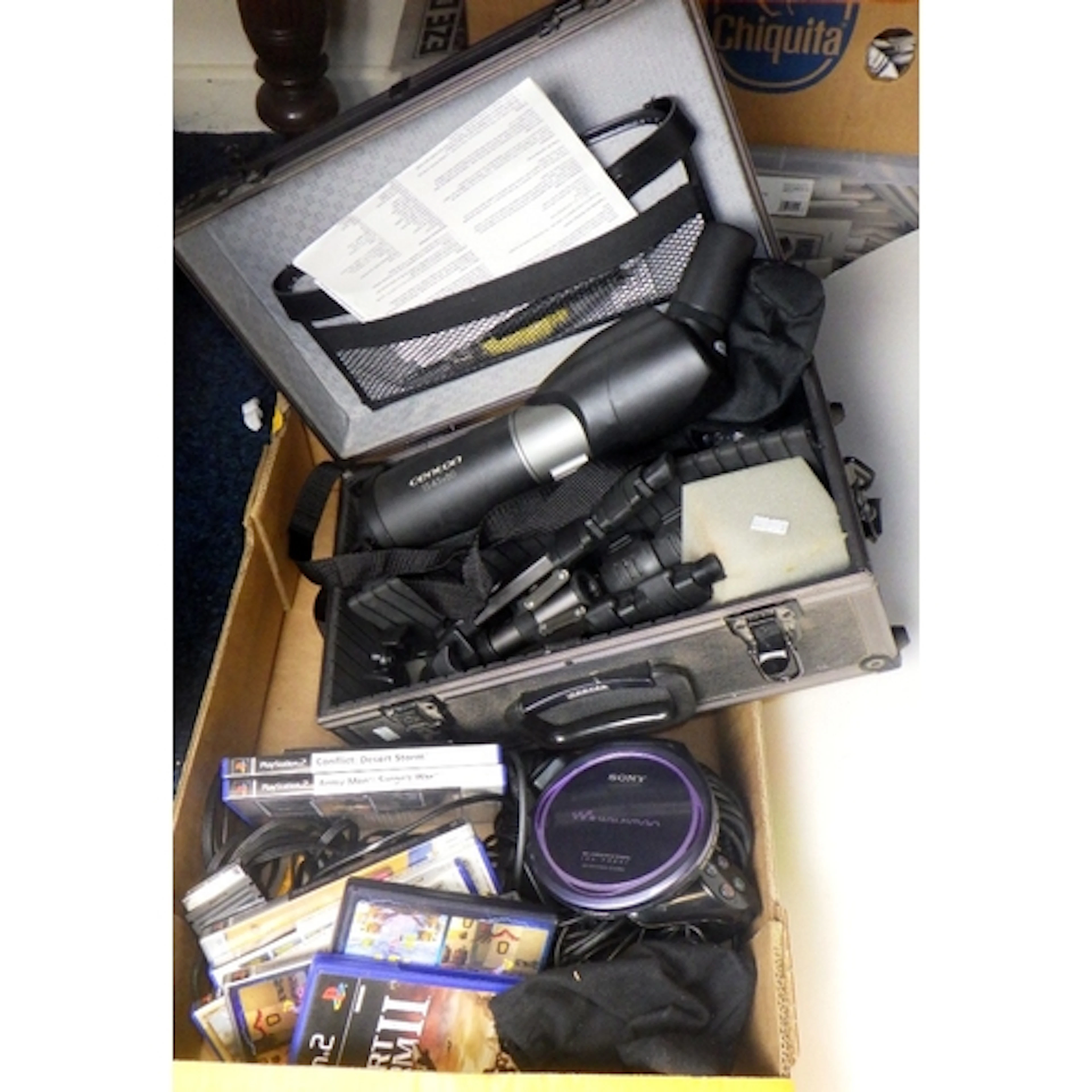 A Centon telescope together with a qty of PlayStation games