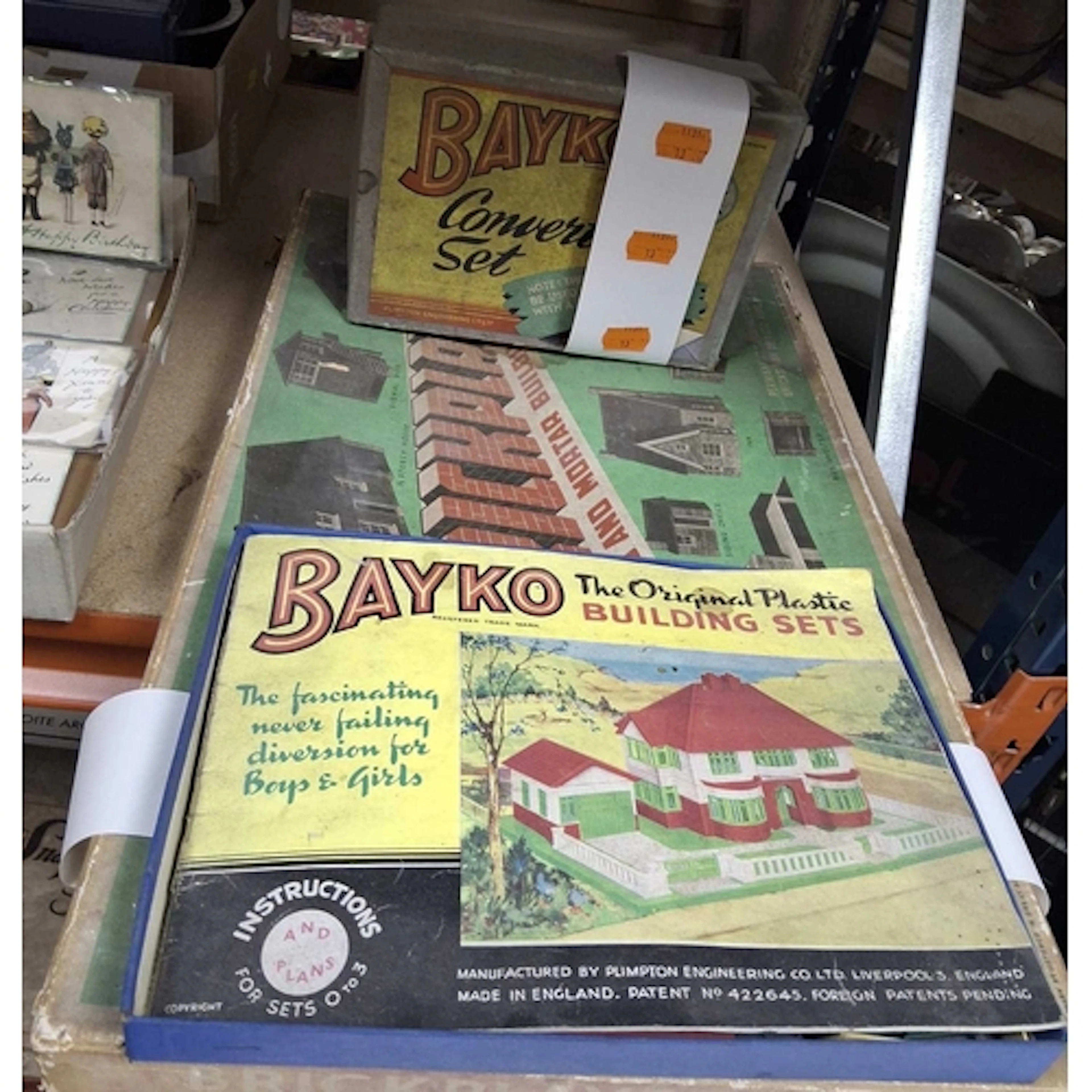 A SMALL GROUP OF TOY VINTAGE BUILDING SETS, to include a Bay...