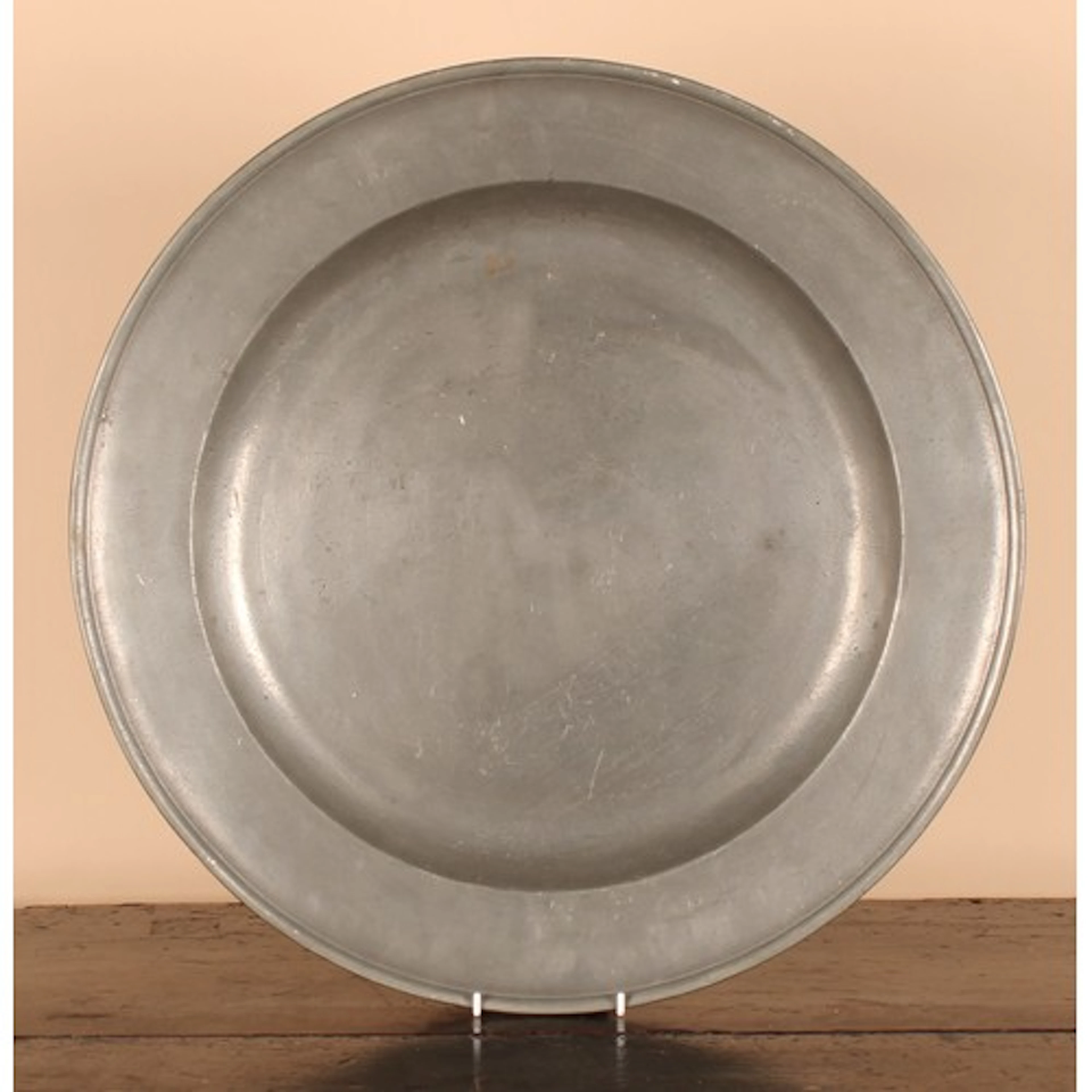 An early 18th century pewter charger, possibly by Sir John F...