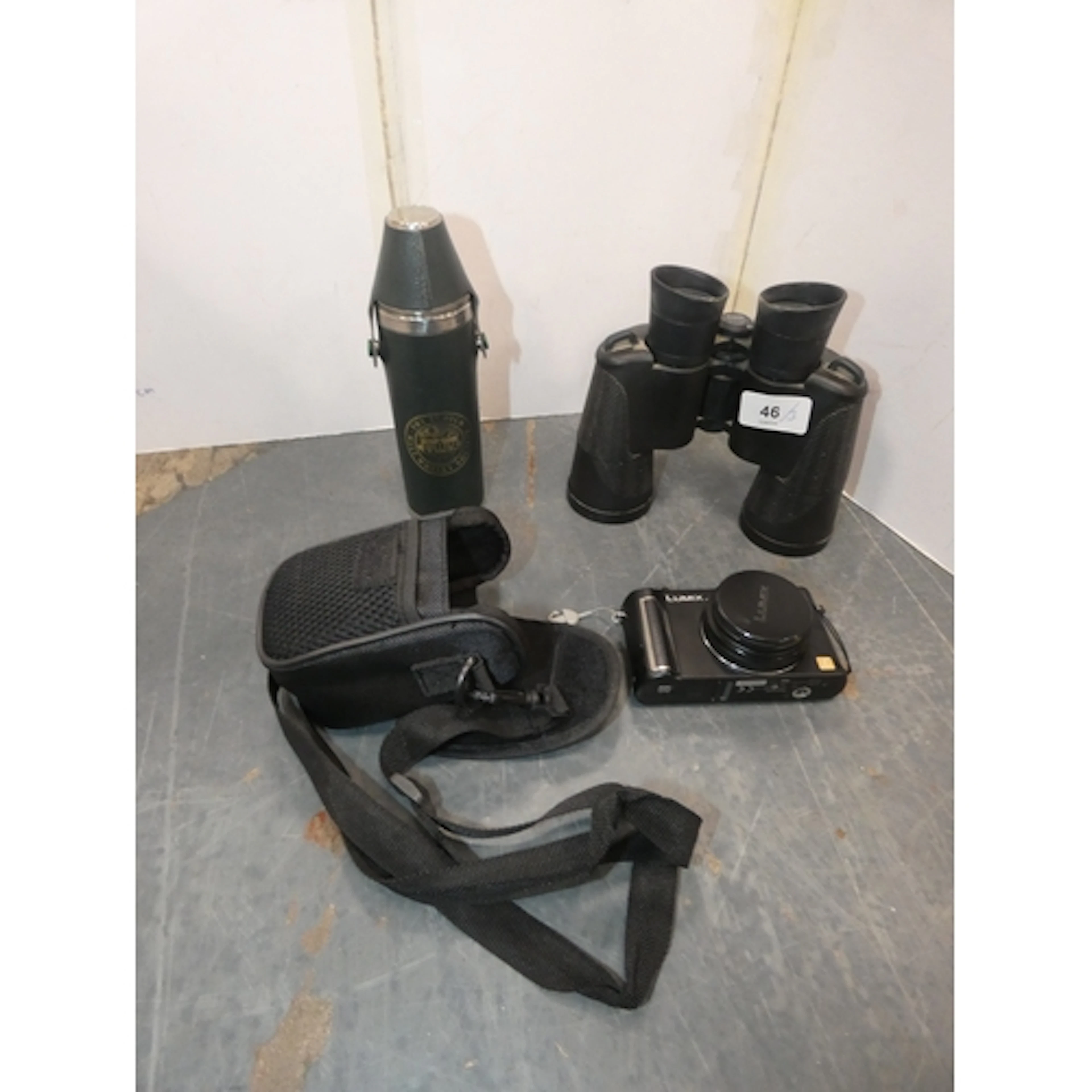 Pair of Bushnell binoculars, Panasonic DMC-LX3 digital camer...