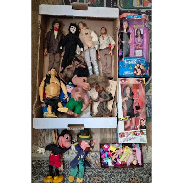 A box of assorted vintage toys to include Action Man dolls, ...