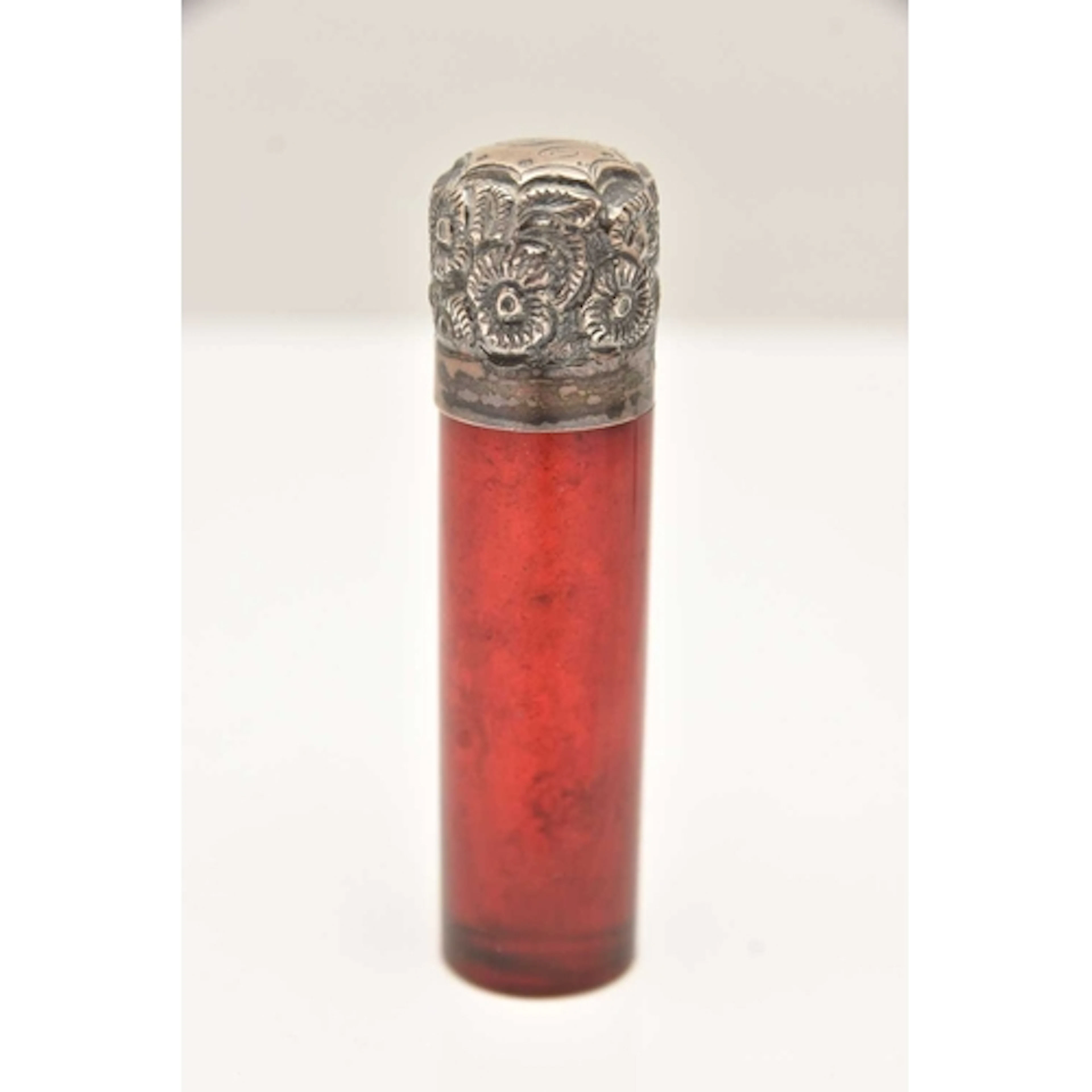 A SILVER MOUNTED SCENT BOTTLE, a cranberry red scent bottle,...