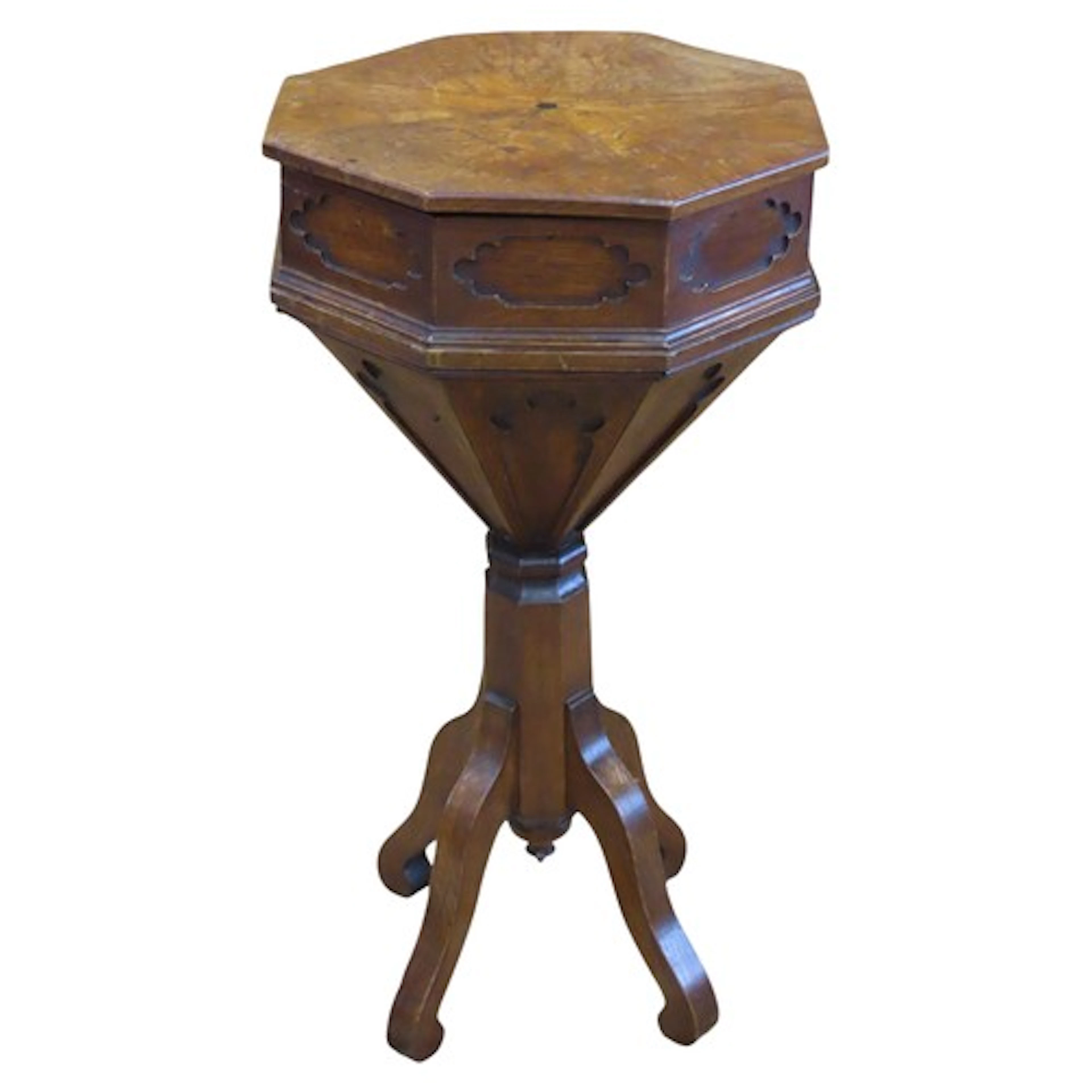A gothic revival sewing/work table of octagonal tapered form...