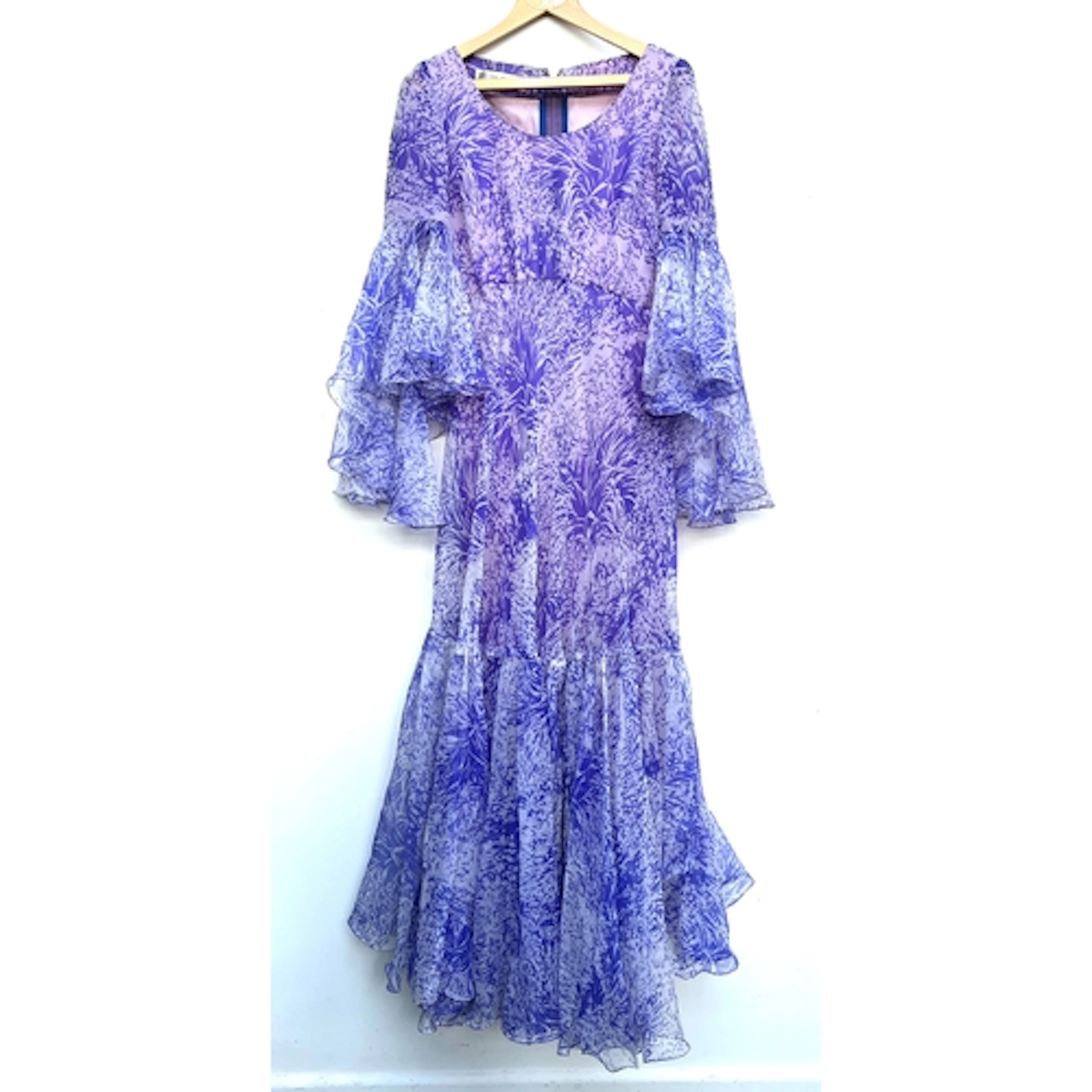 An Ian Thomas London purple long sleeved dress with pink lin...