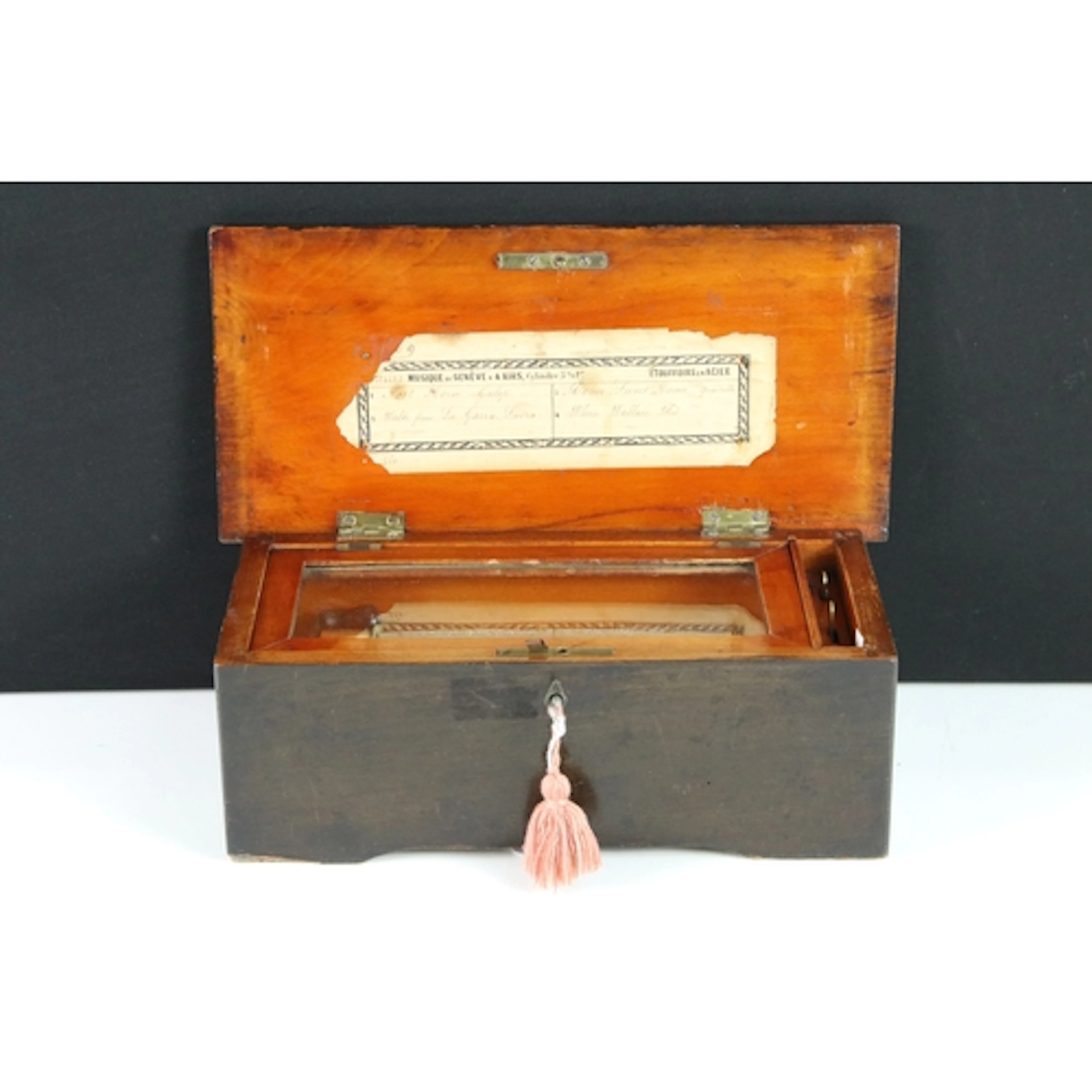 19th century mahogany Swiss music box, having four airs. Mea...