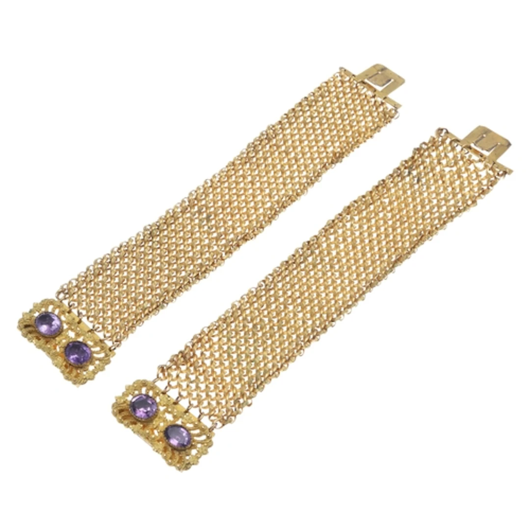 A PAIR OF 19TH CENTURY AMETHYST AND GILT BRACELETS. each bra...
