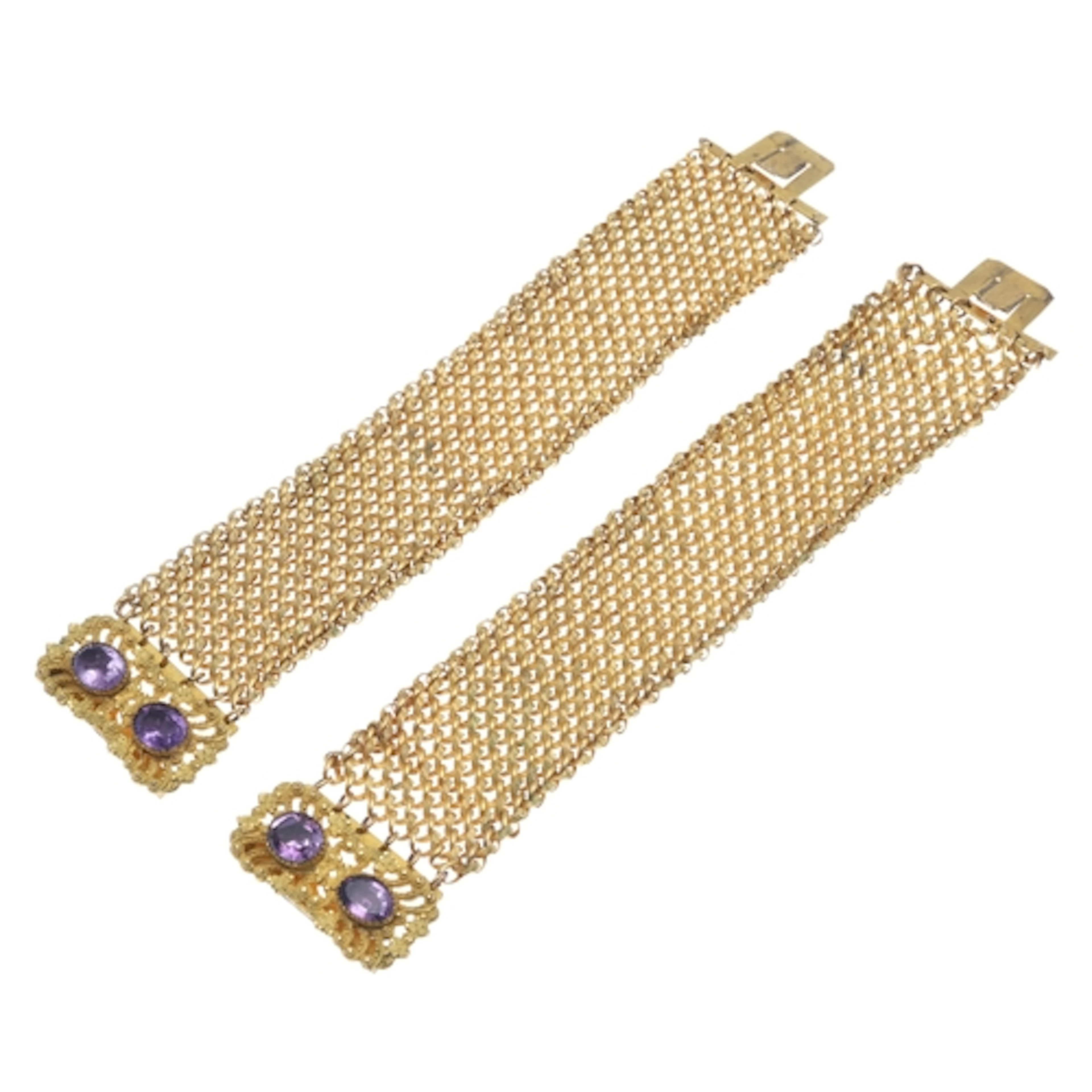 A PAIR OF 19TH CENTURY AMETHYST AND GILT BRACELETS. each bra...