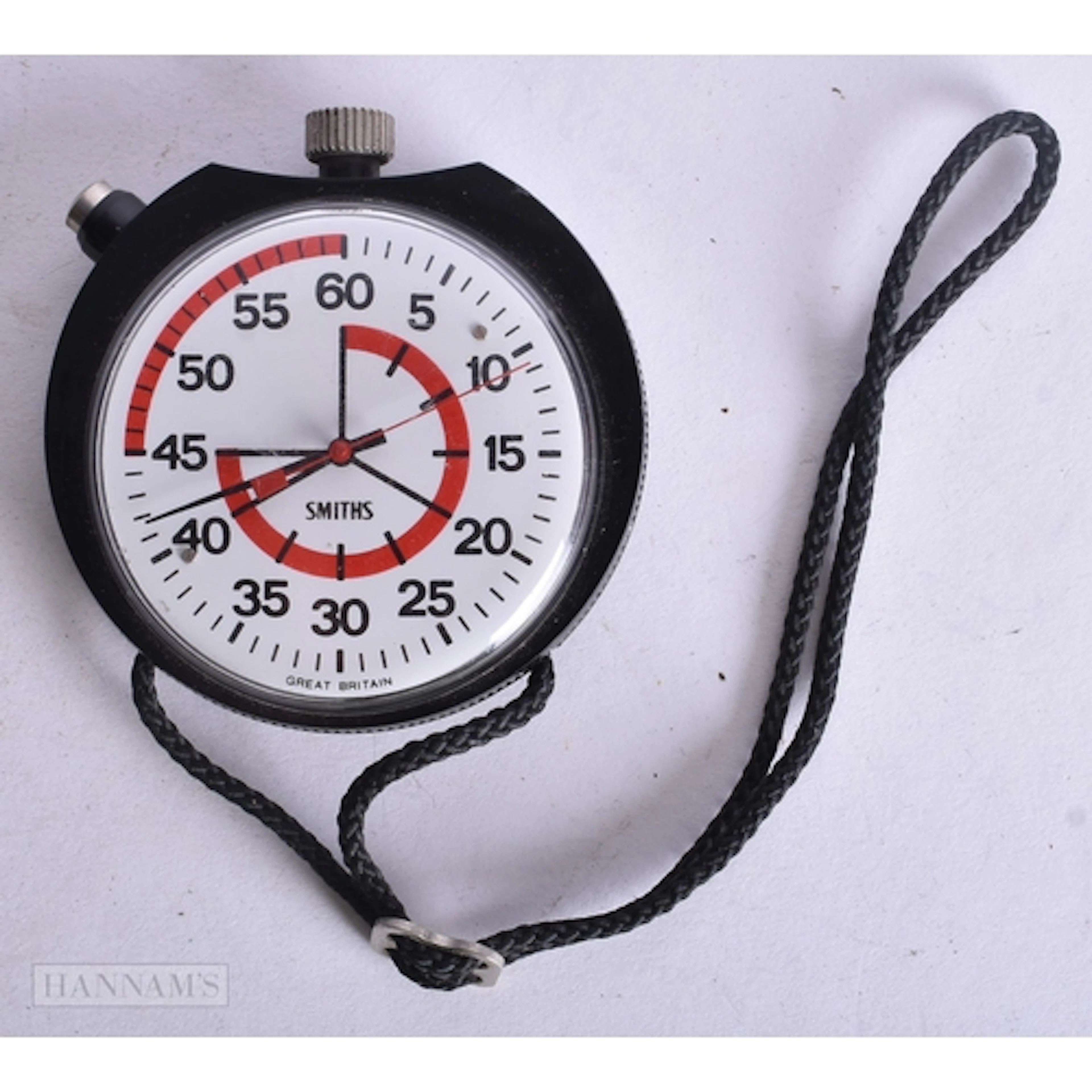 A SMITHS STOP WATCH. Running. 6.75 cm wide.