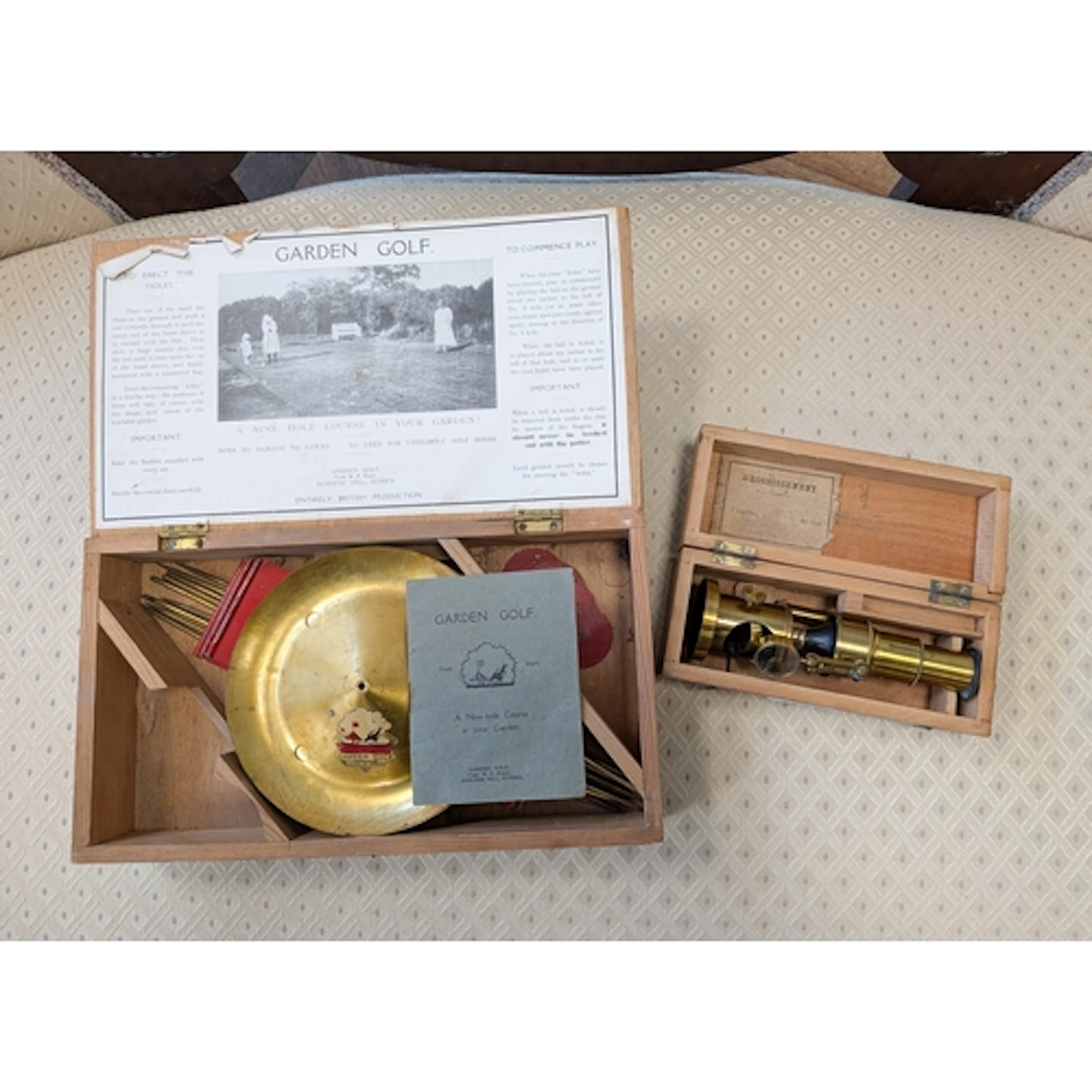 A vintage set of garden golf in box and a brass French micro...