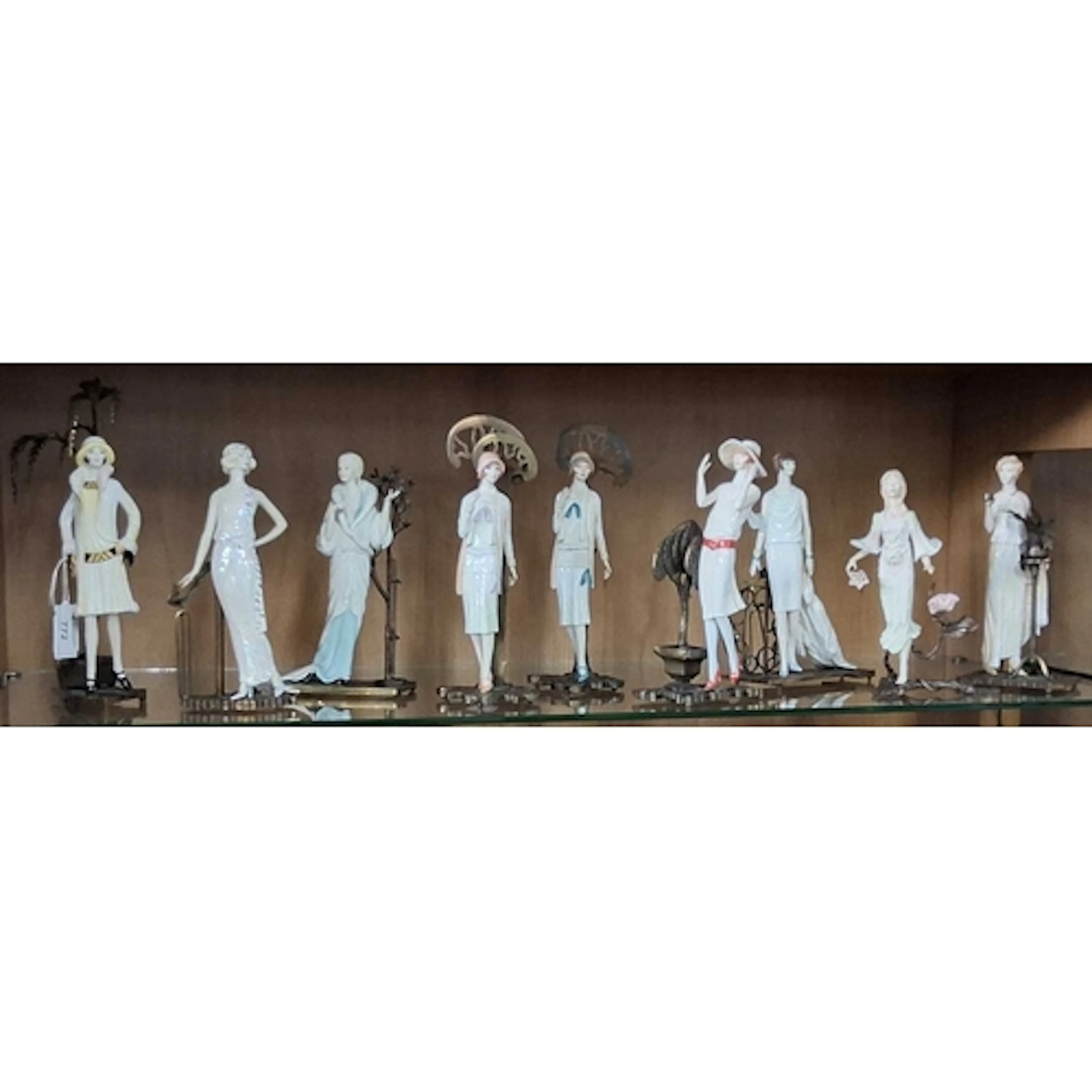 NINE ALBANY CHINA FIGURES, mainly Art Deco style, with brass...