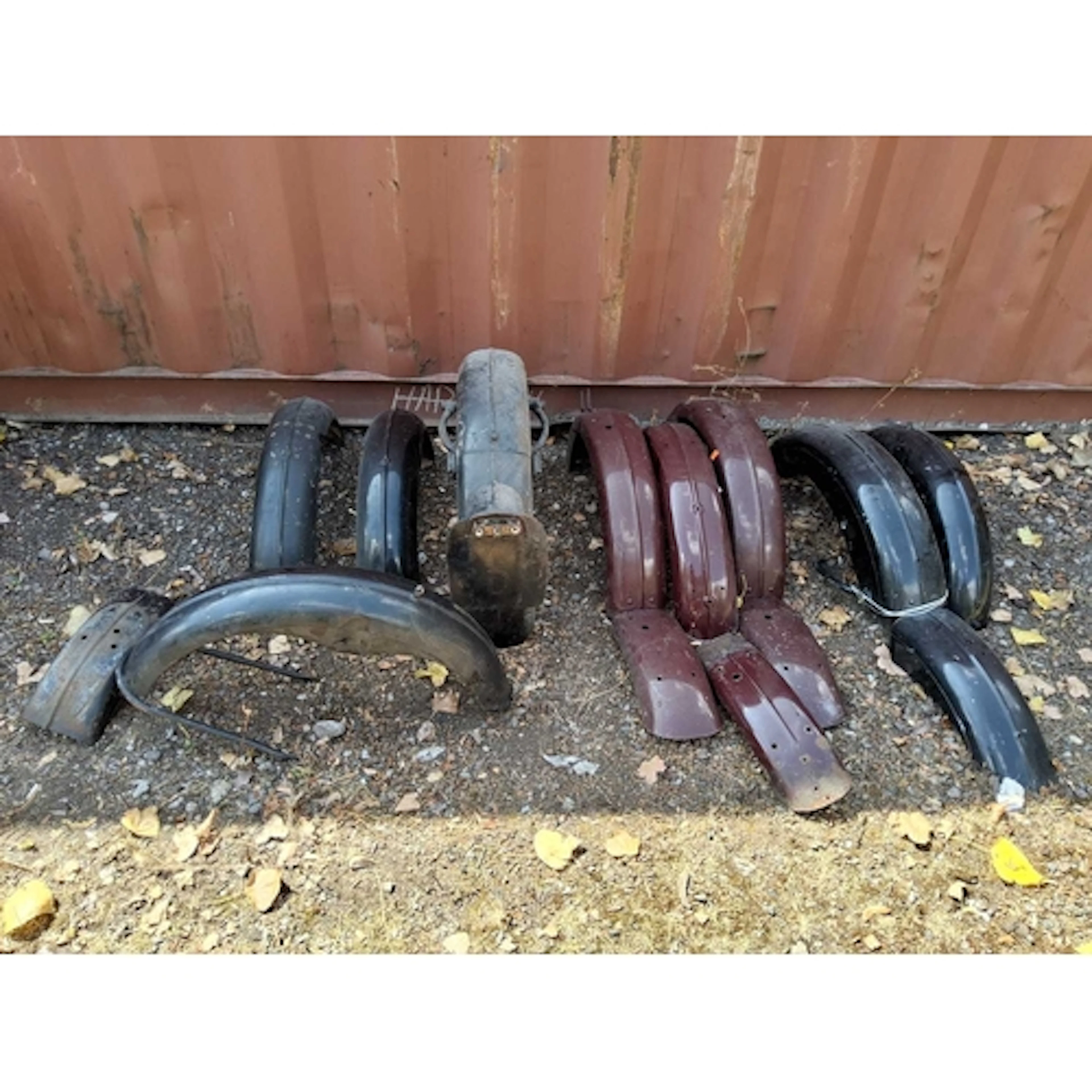 NINE VINTAGE BRITISH MOTORCYCLE MUDGUARDS, including a pair ...