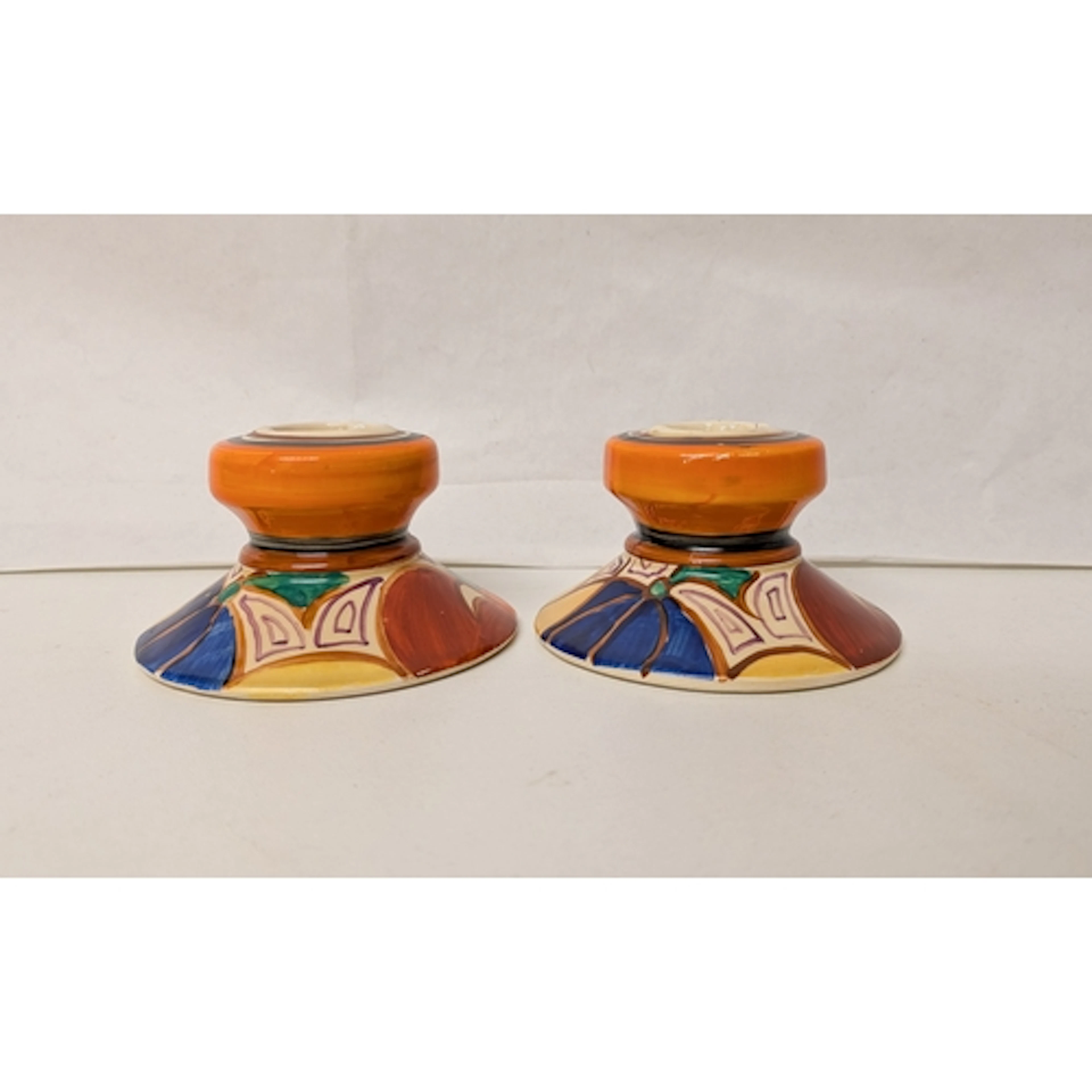 Clarice Cliff Fantasque - a pair of melon candle sticks