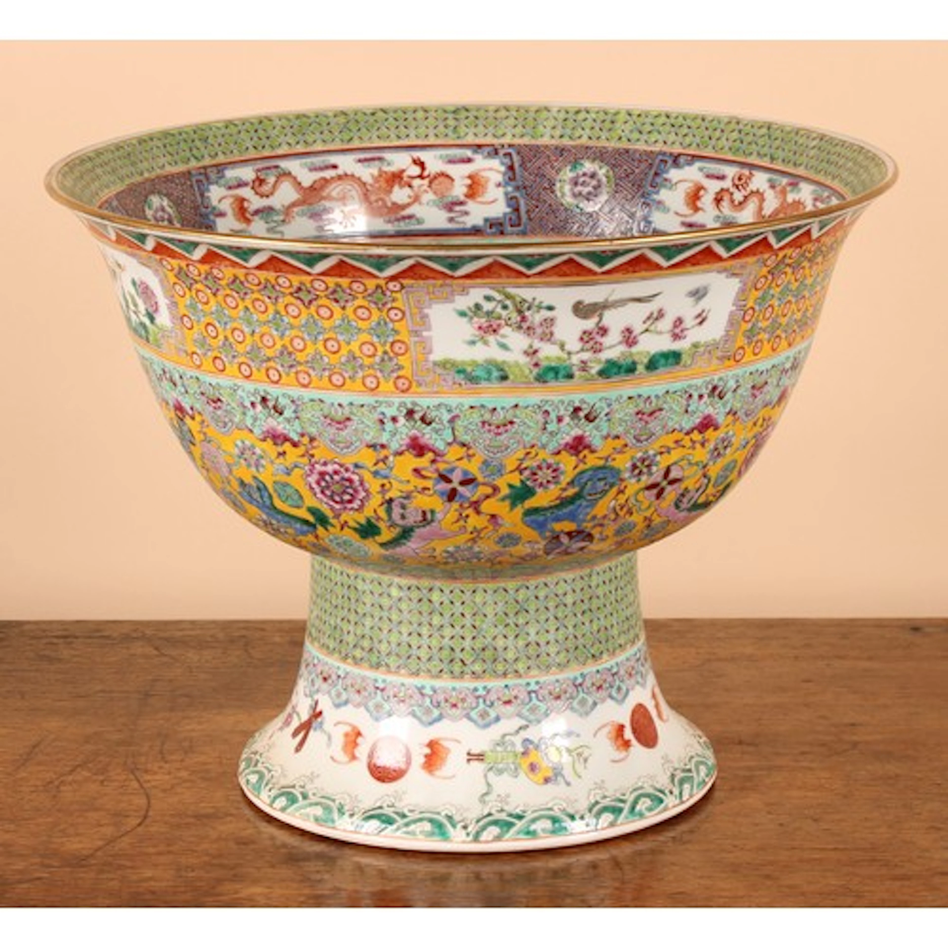A Chinese circular pedestal temple bowl, painted in the fami...