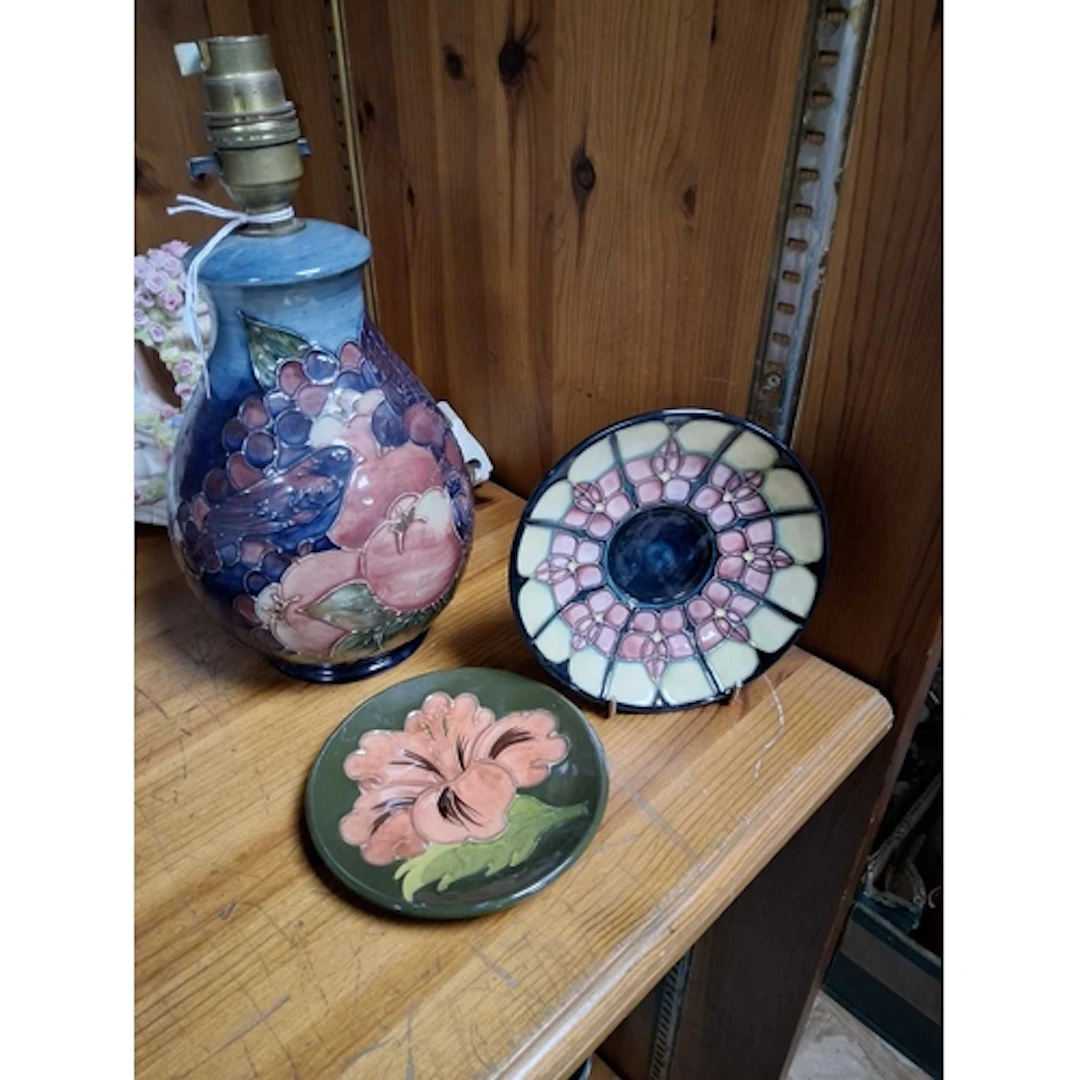 THREE PIECES OF MOORCROFT POTTERY comprising a 'Finches and ...