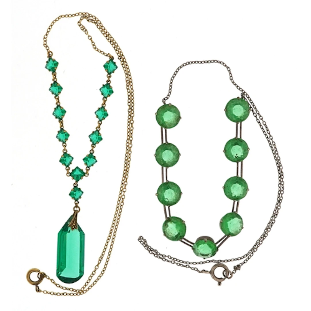 Two Art Deco style green stone necklaces, the largest 40cm i...