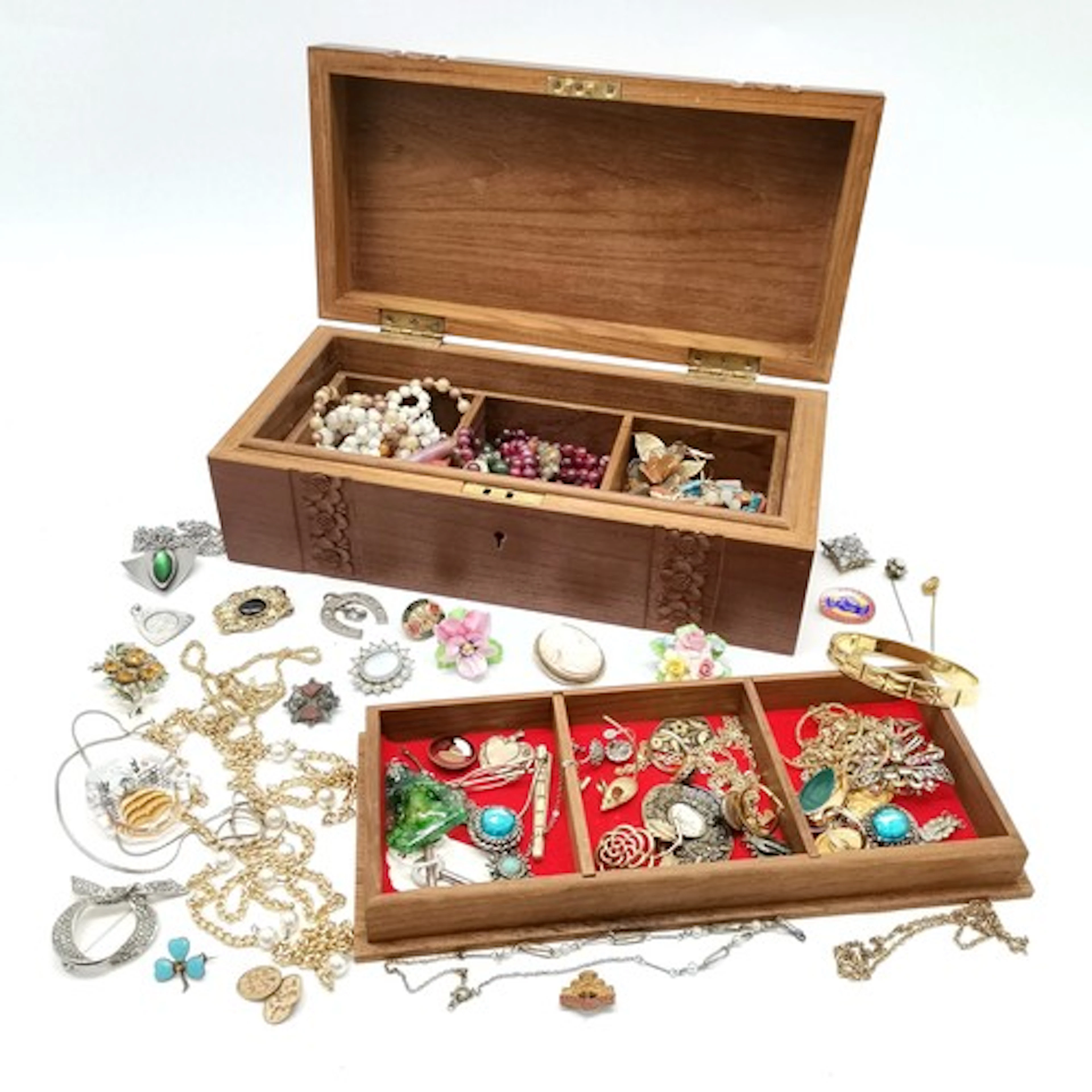 Carved wooden jewellery box containing a quantity of jewelle...