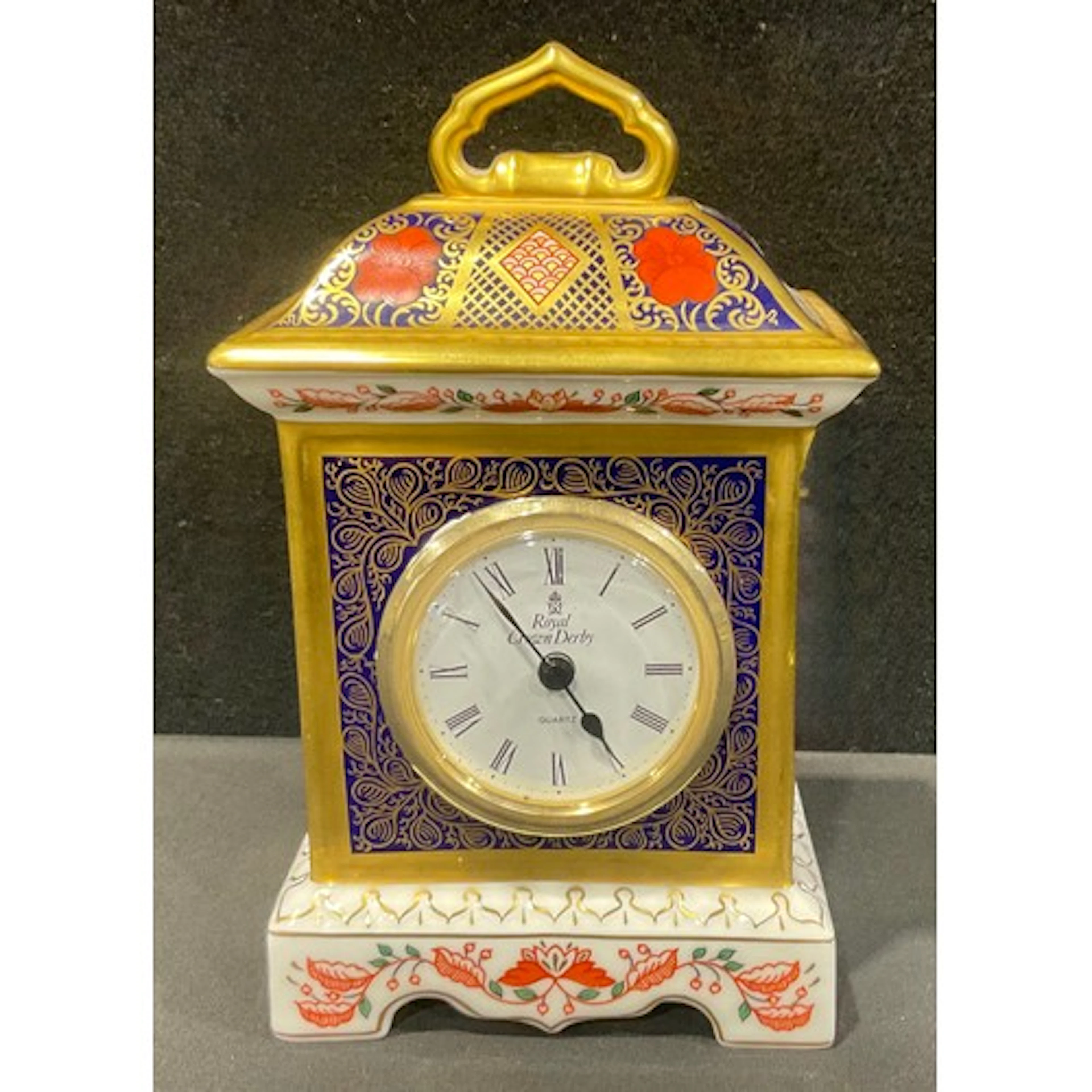 A Royal Crown Derby 1128 Imari pattern mantel clock, 18cm hi...