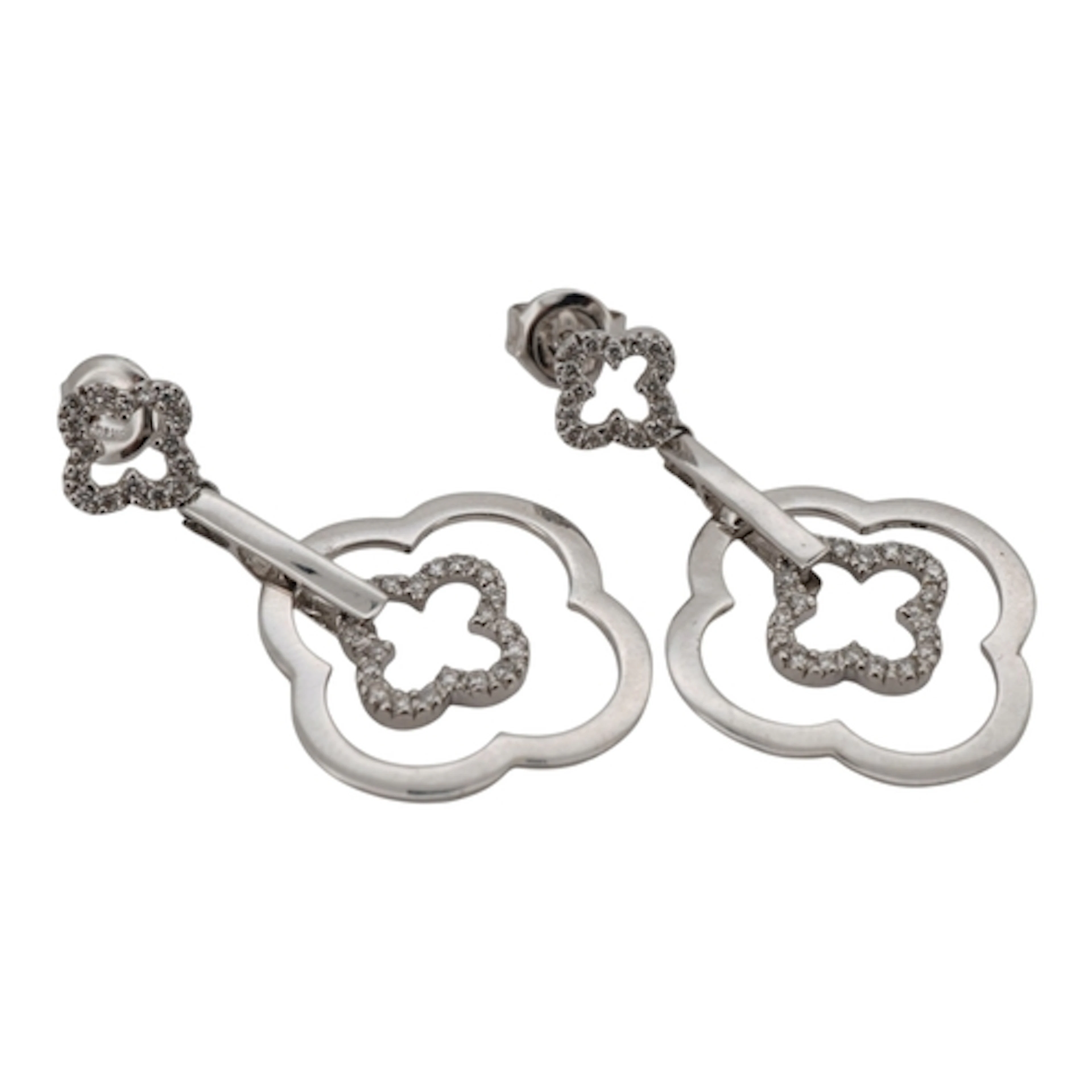 A pair of diamond earrings, each composed of quatrefoil moti...