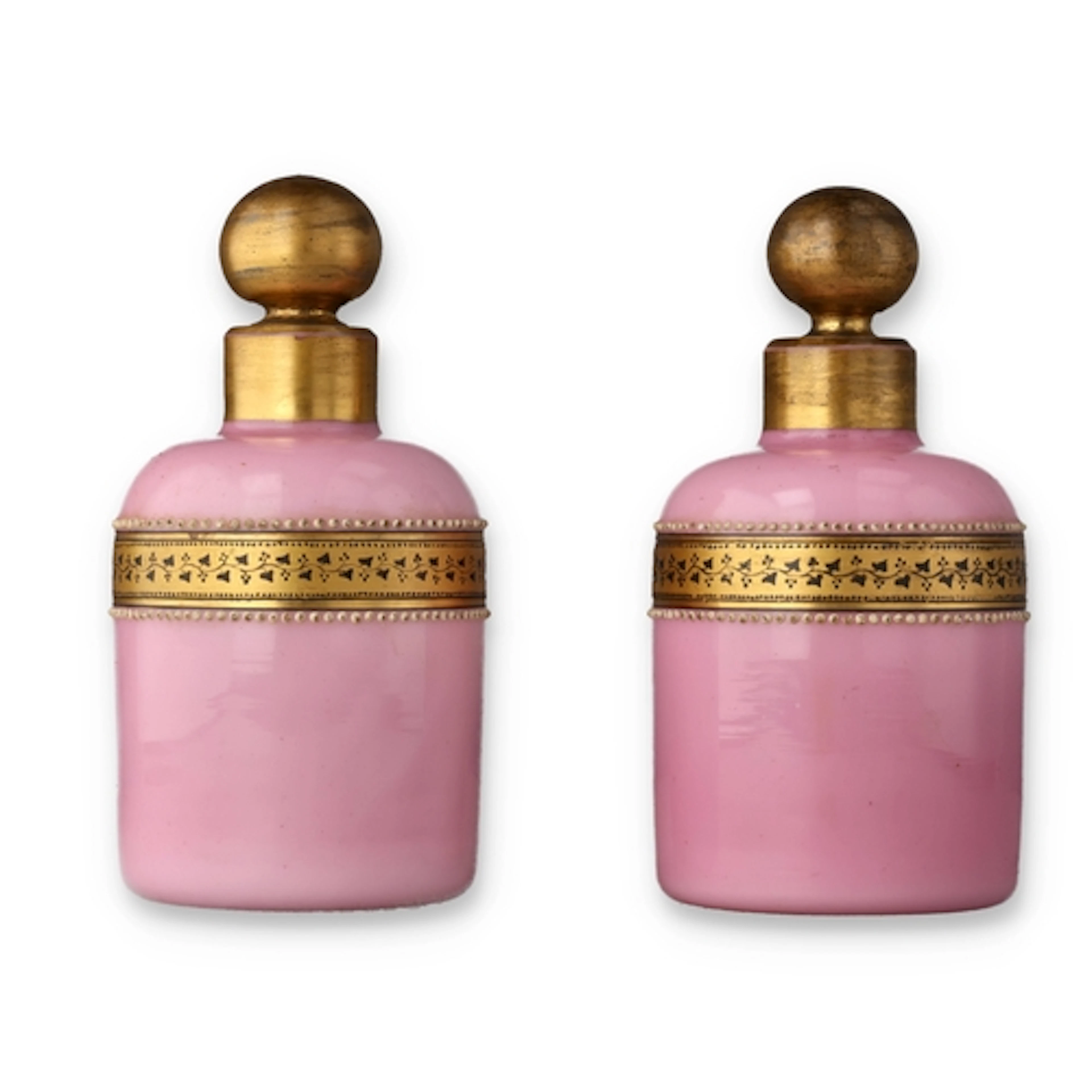 A PAIR OF 19TH CENTURY PINK OPALINE GLASS BOTTLES With gilde...