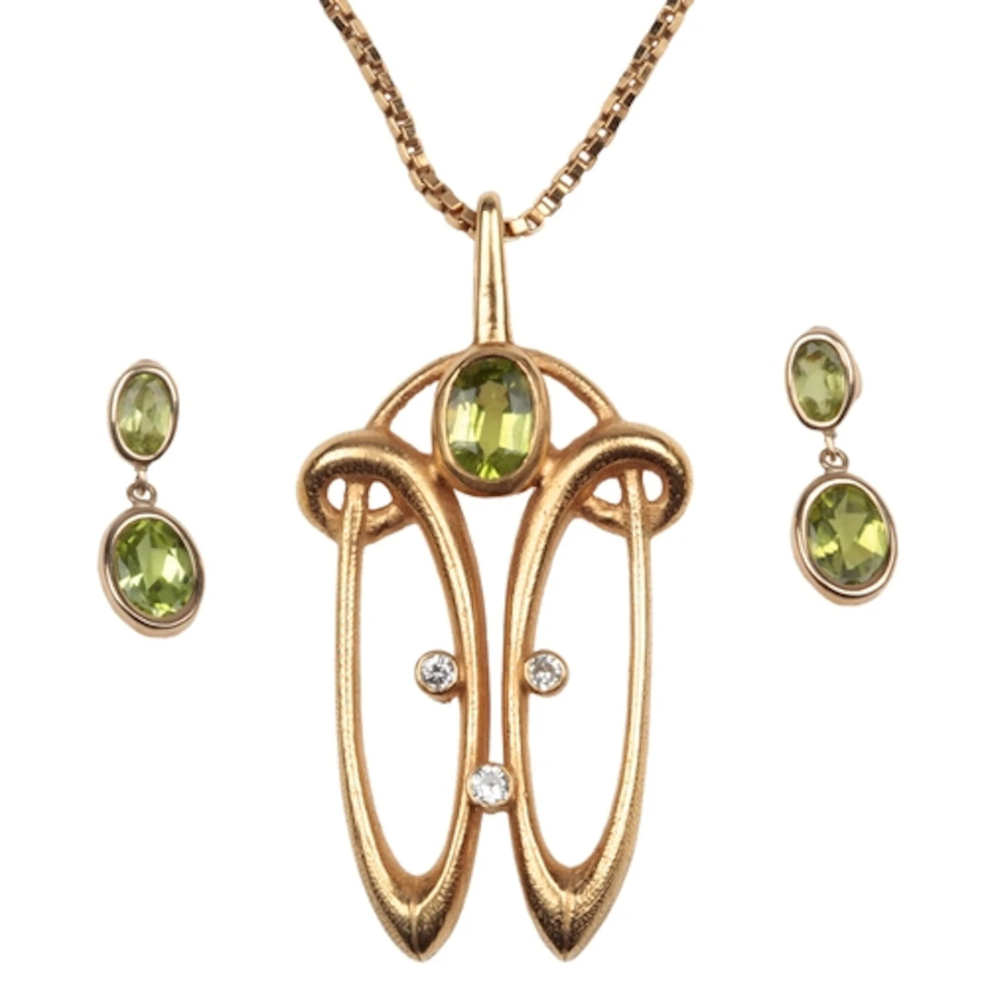 A gold and peridot necklace and earrings, circa 1983, the pe...
