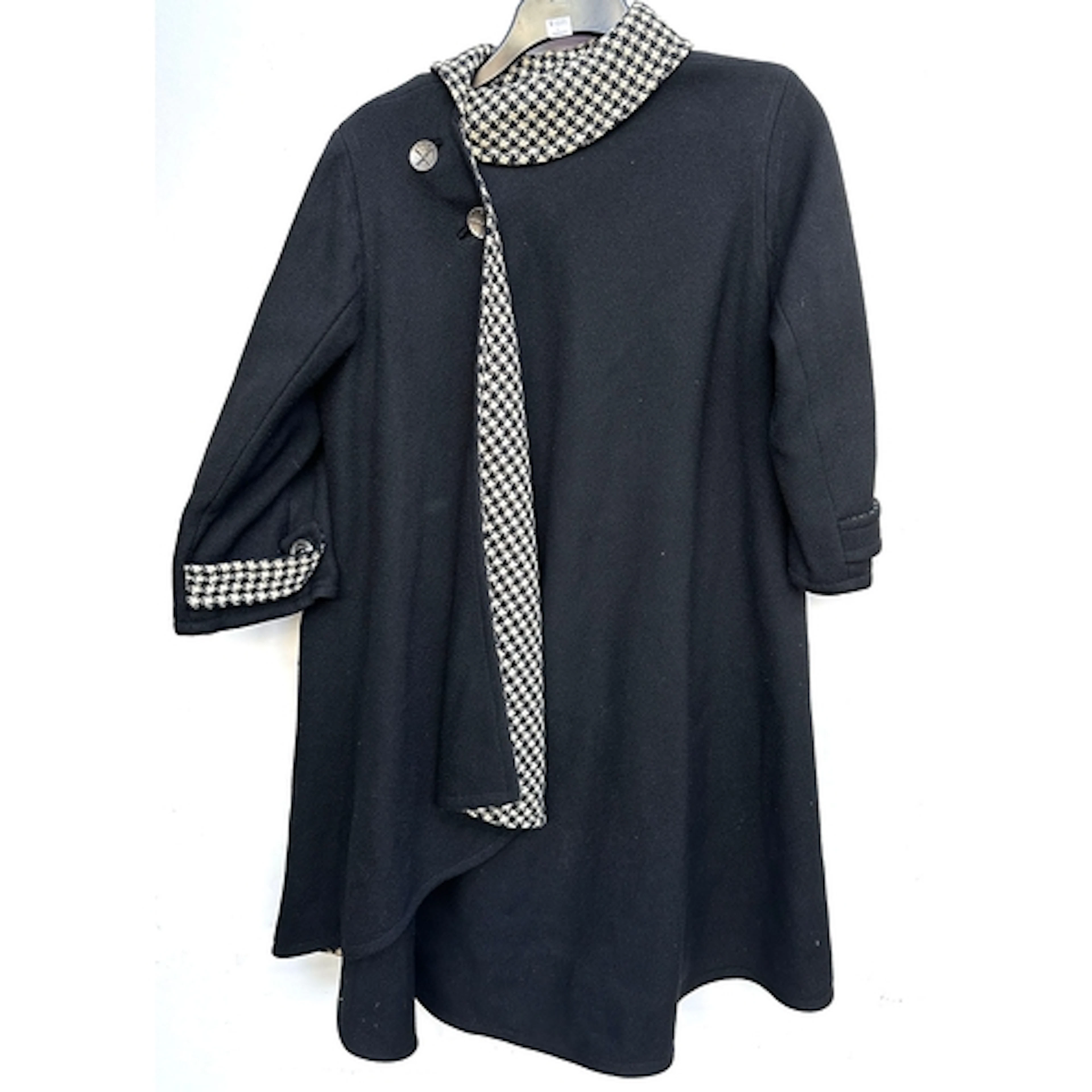 A 1950s black and houndstooth reversible ladies overcoat