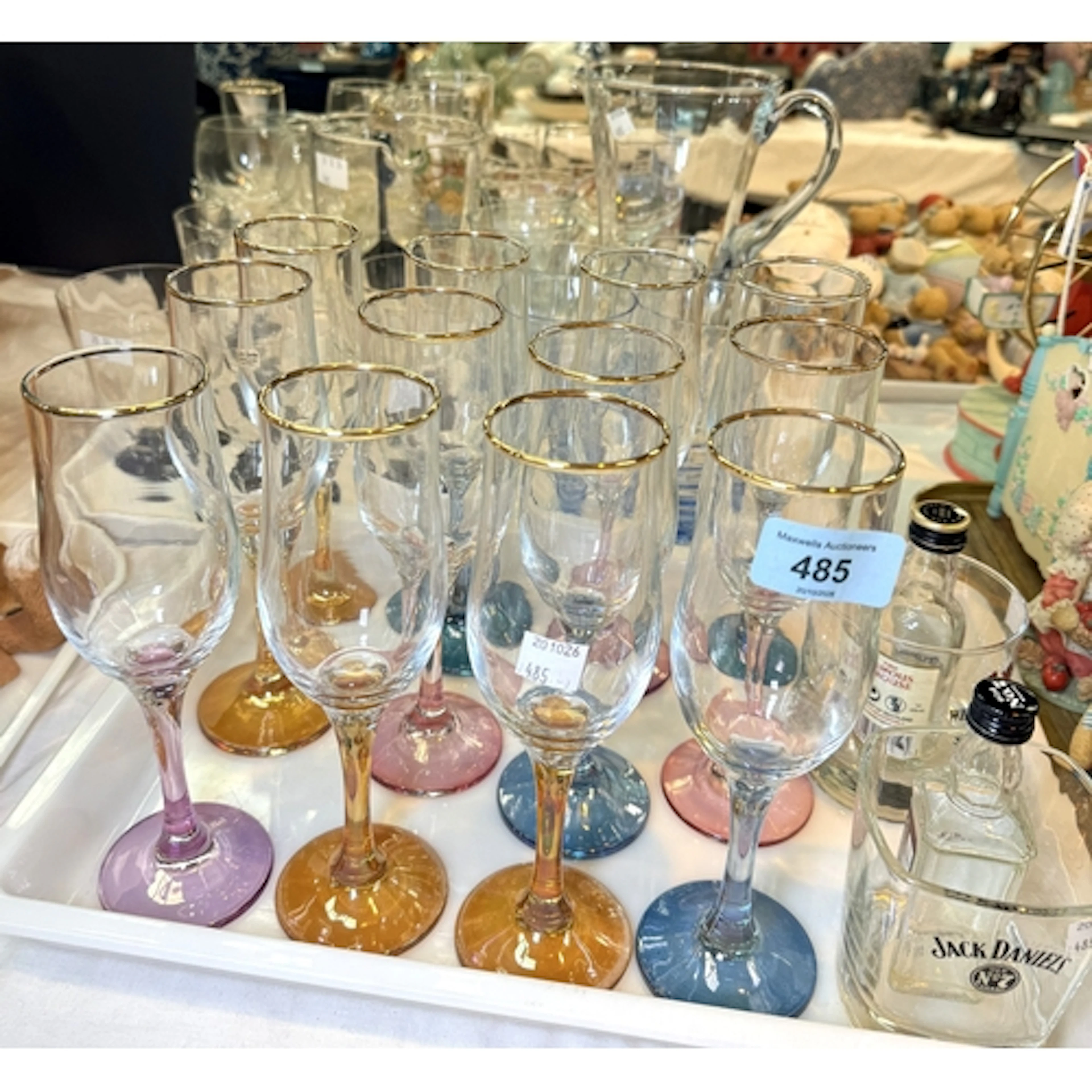 A collection of advertising whisky tumblers, similar glasses...