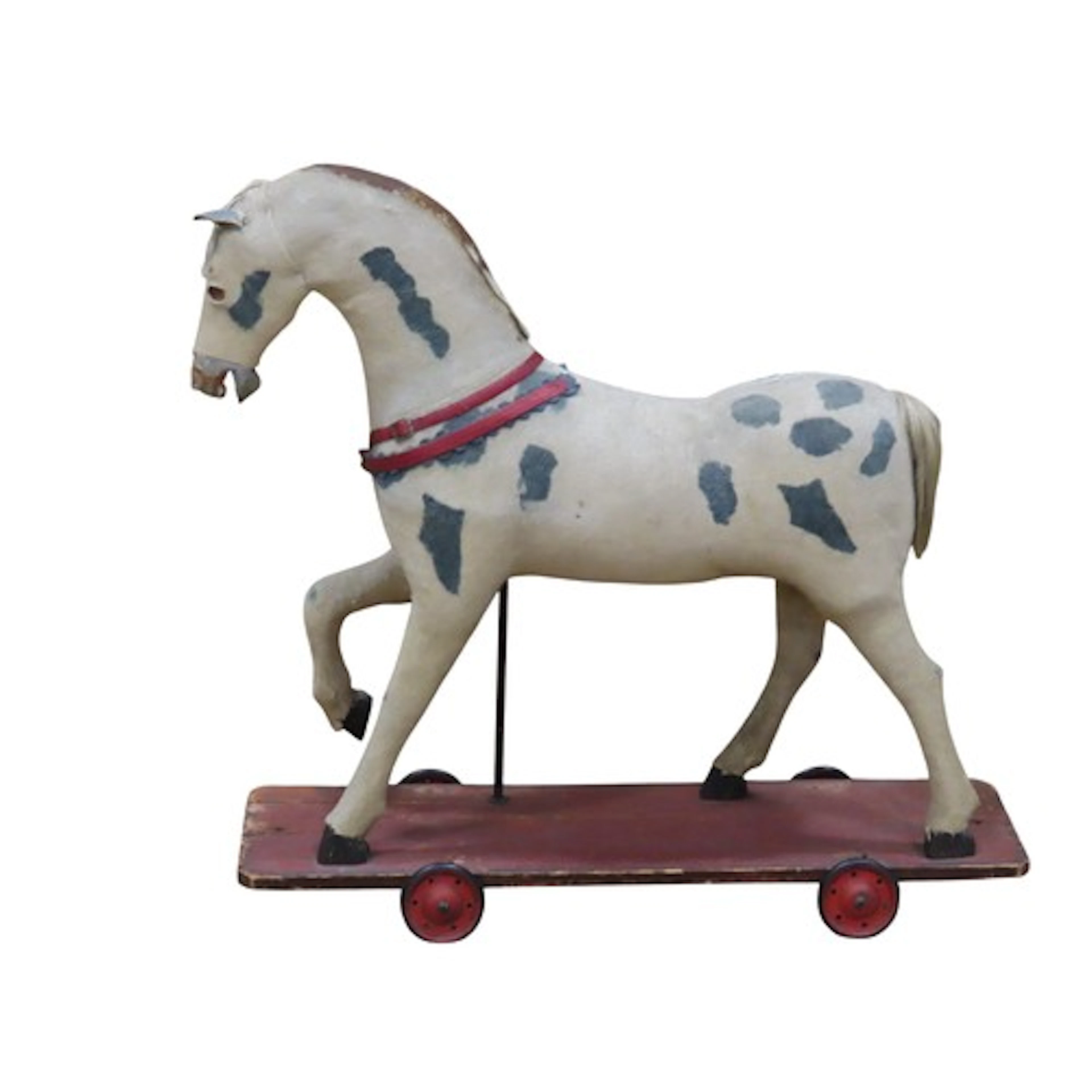 An antique child's toy push along horse raised on a four whe...