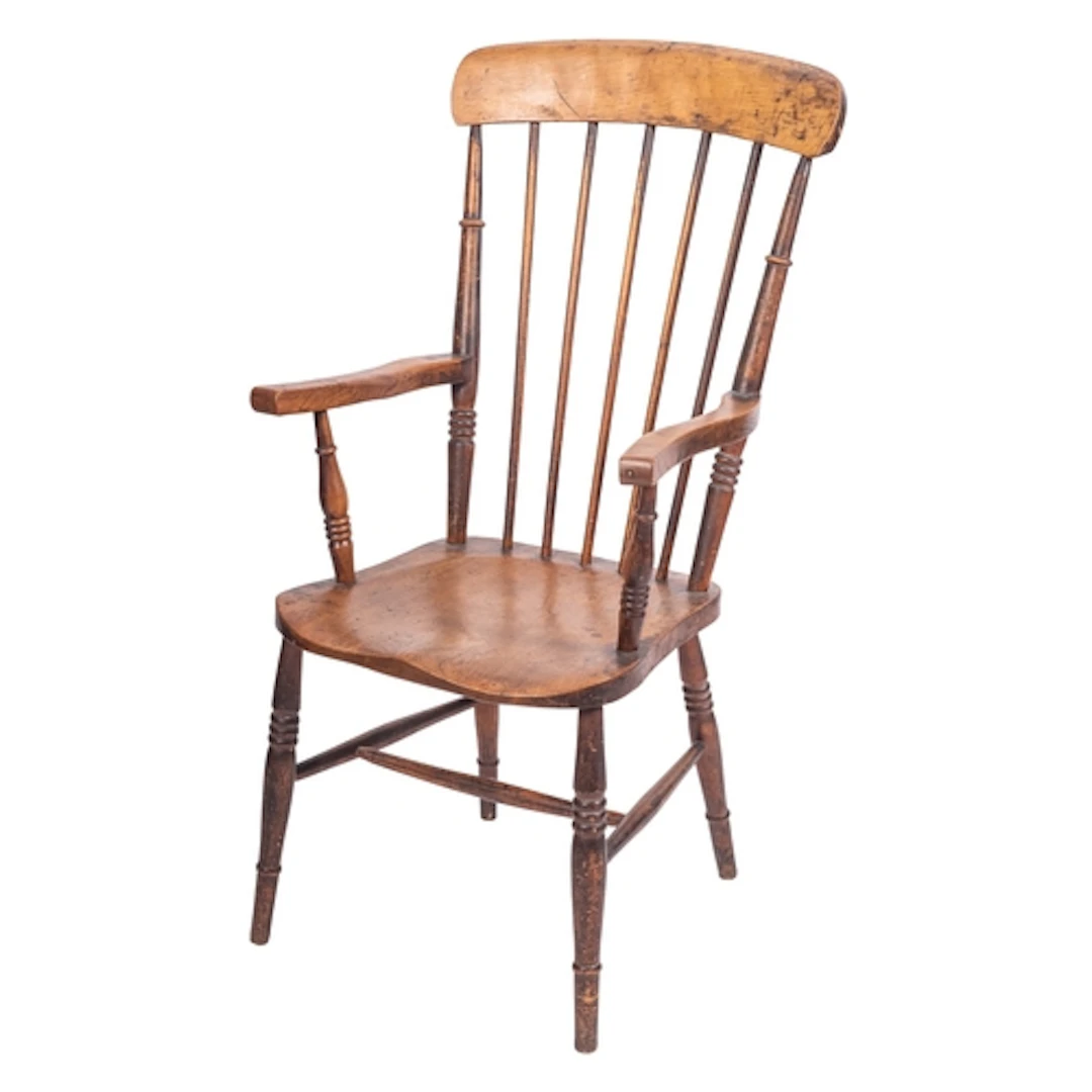 An elm and beech spindle back kitchen elbow chair, late 19th...