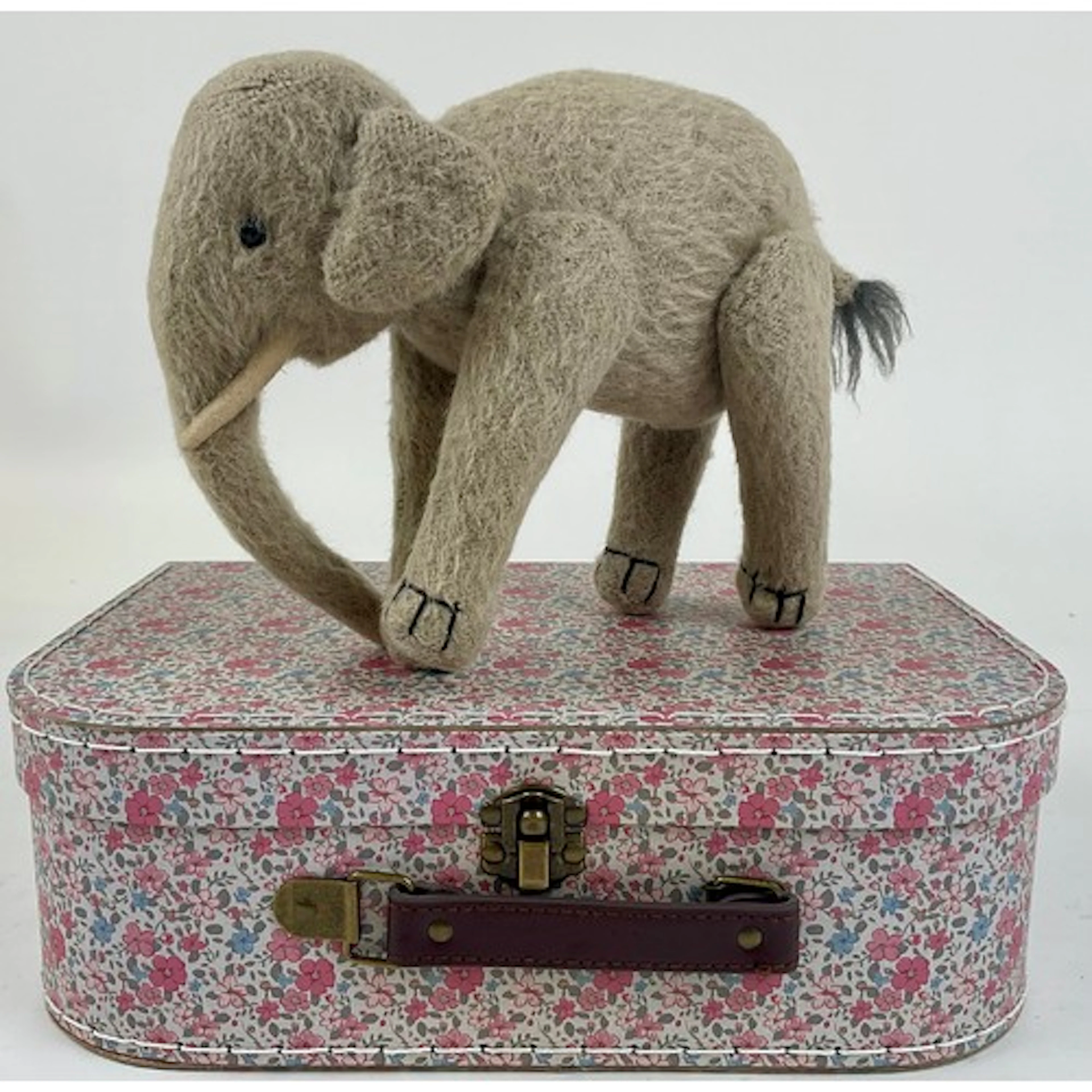 An early 20th century burlap plush jointed elephant, probabl...