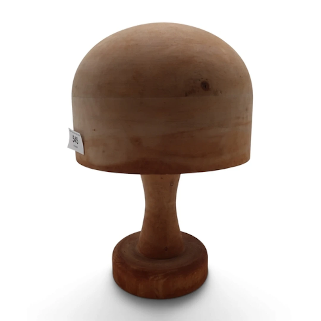 A beechwood milliner's hat block