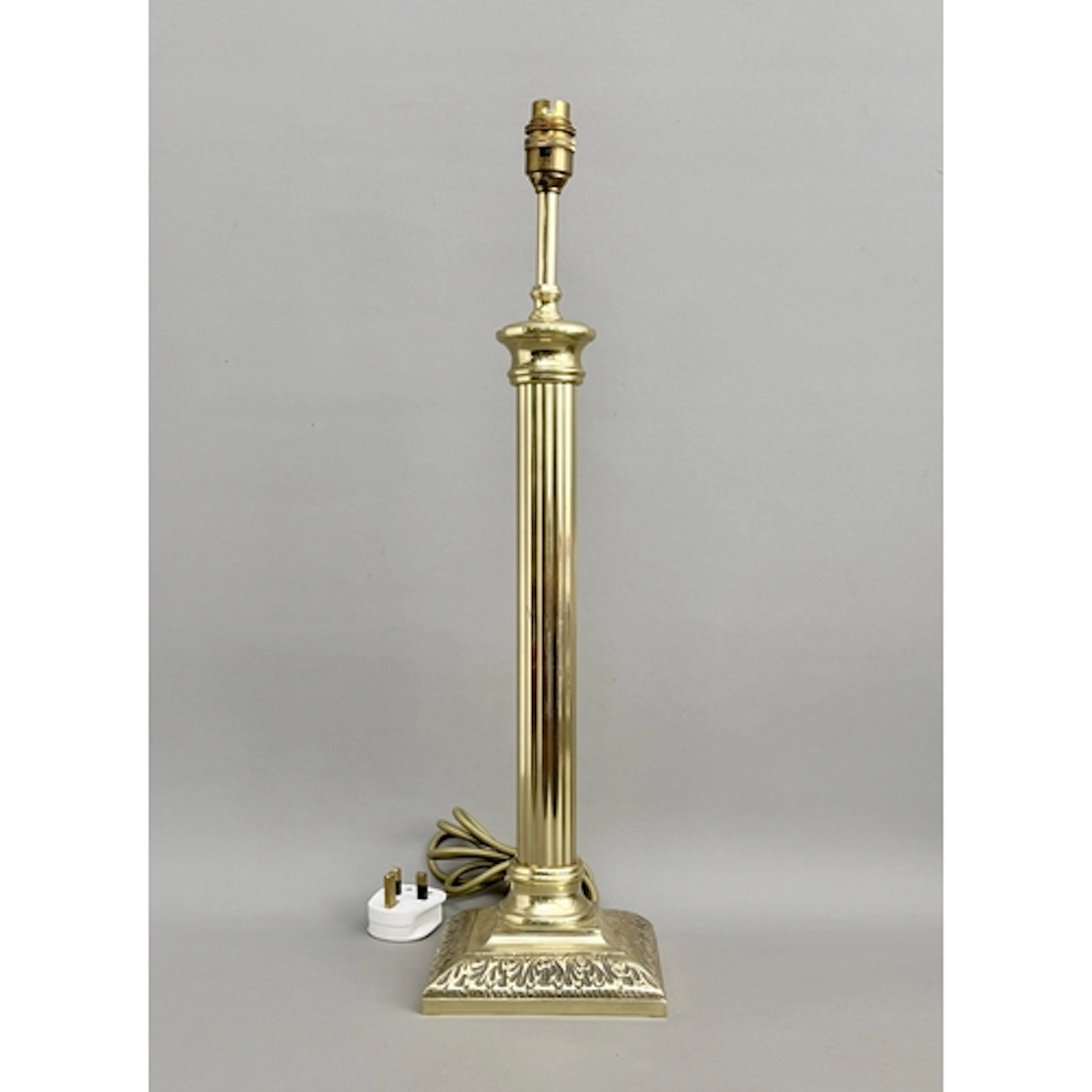 A contemporary brass table lamp base - of a fluted column de...