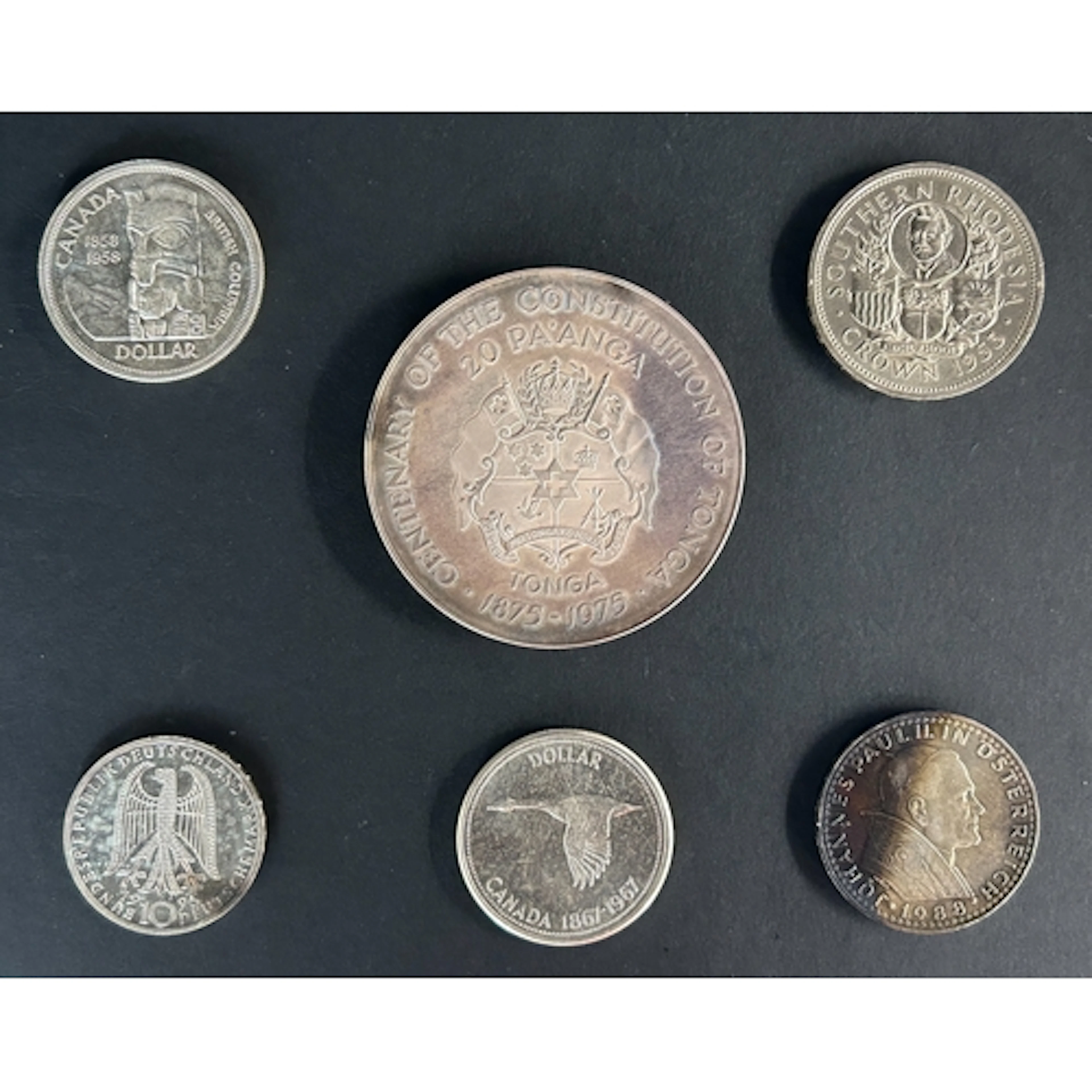 A group of six World 20th Century silver coins, comprising S...