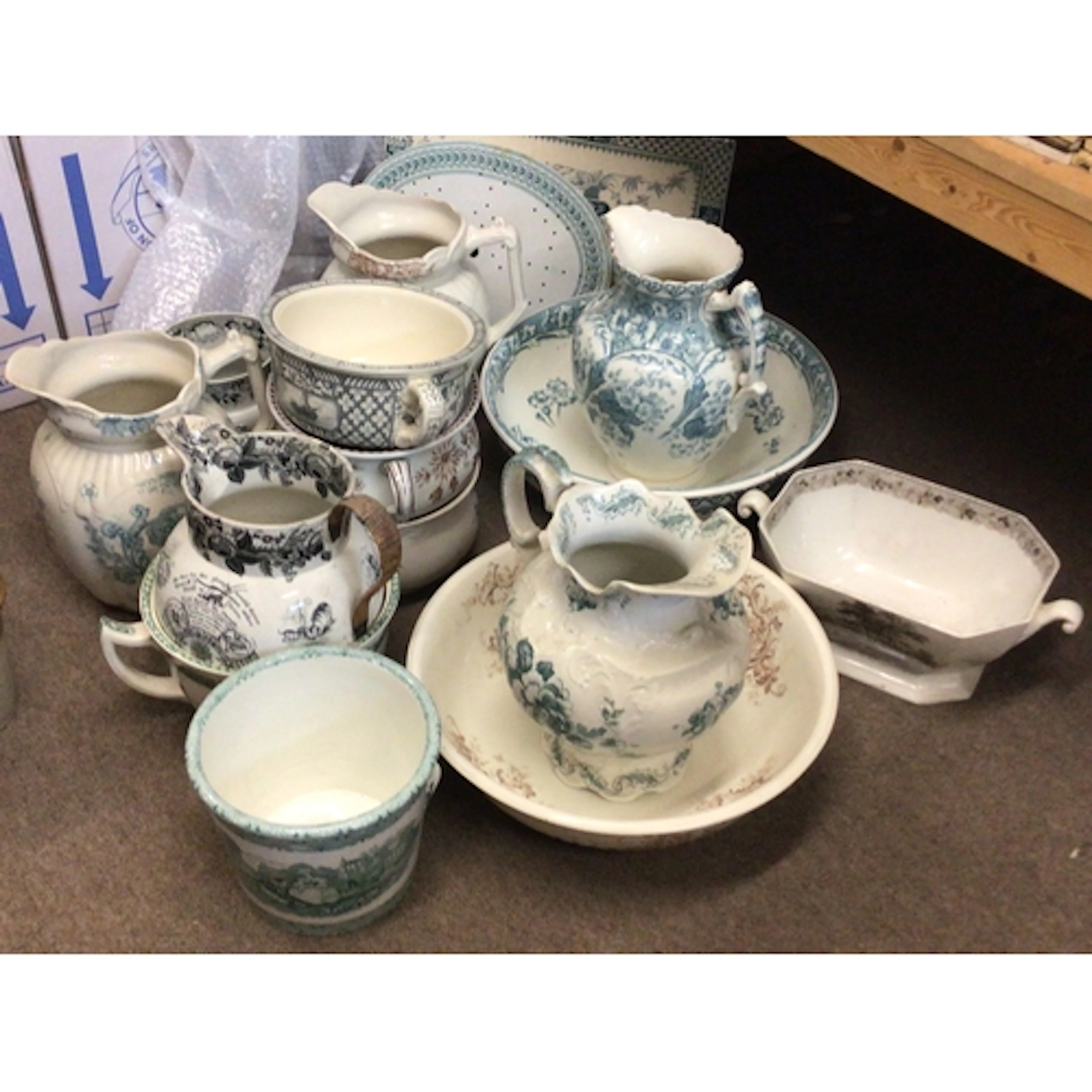 A Collection of Victorian chamber pots washing bowls and jug...