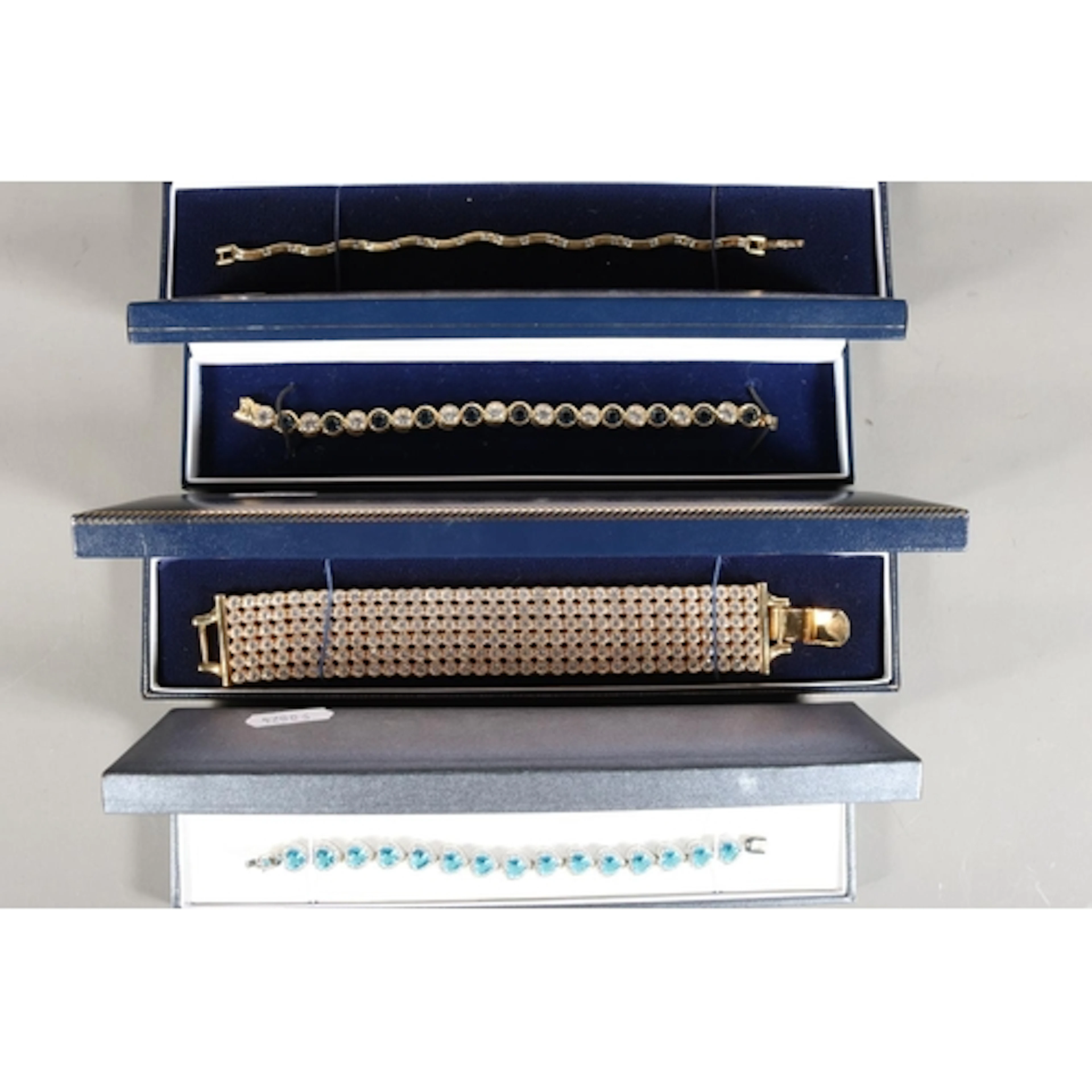 Costume jewellery to include tennis style bracelet held in B...