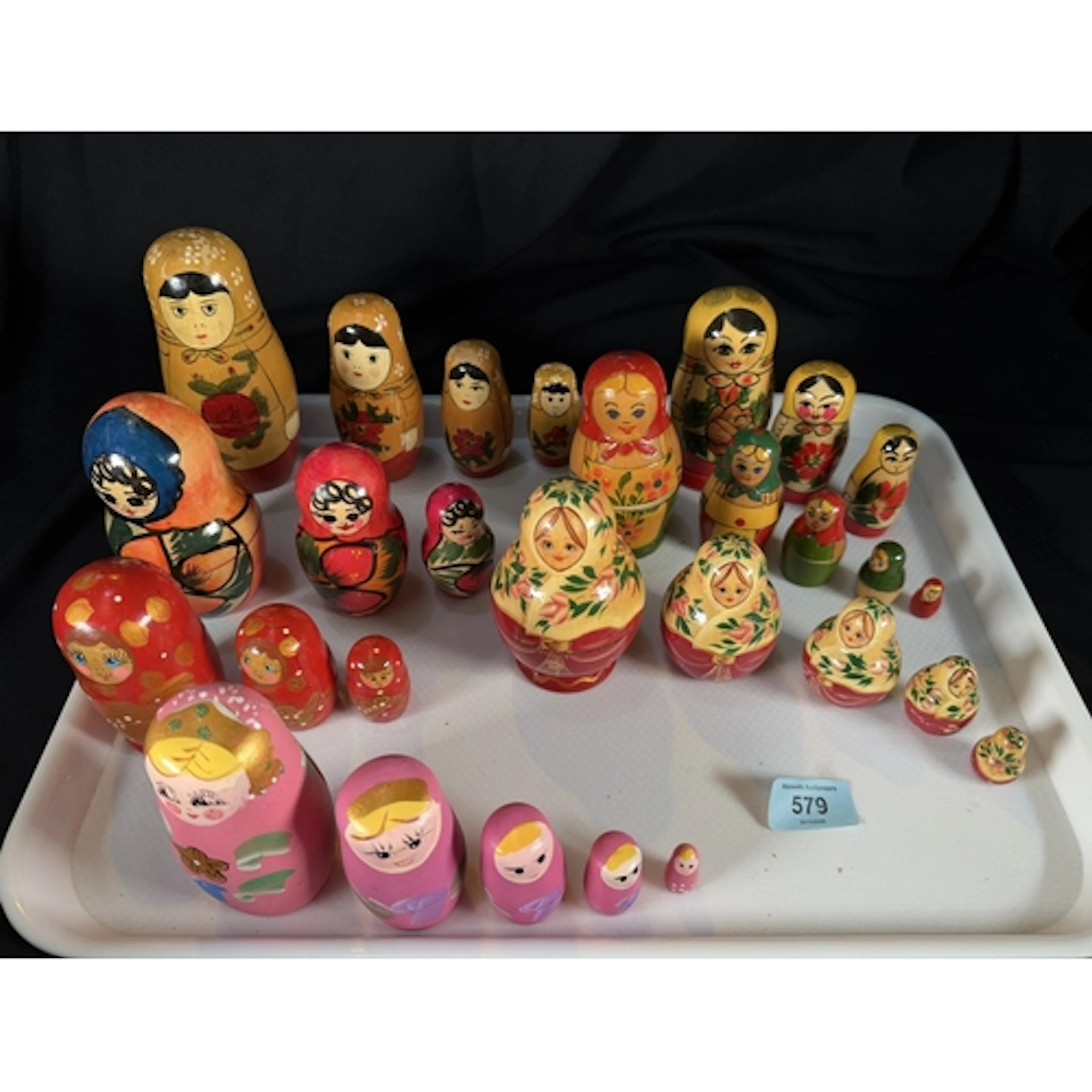 A collection of Russian Matryoshka wooden nests of girl doll...