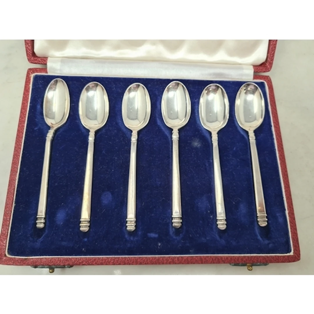 Six Elizabeth II silver Coronation Teaspoons with six differ...