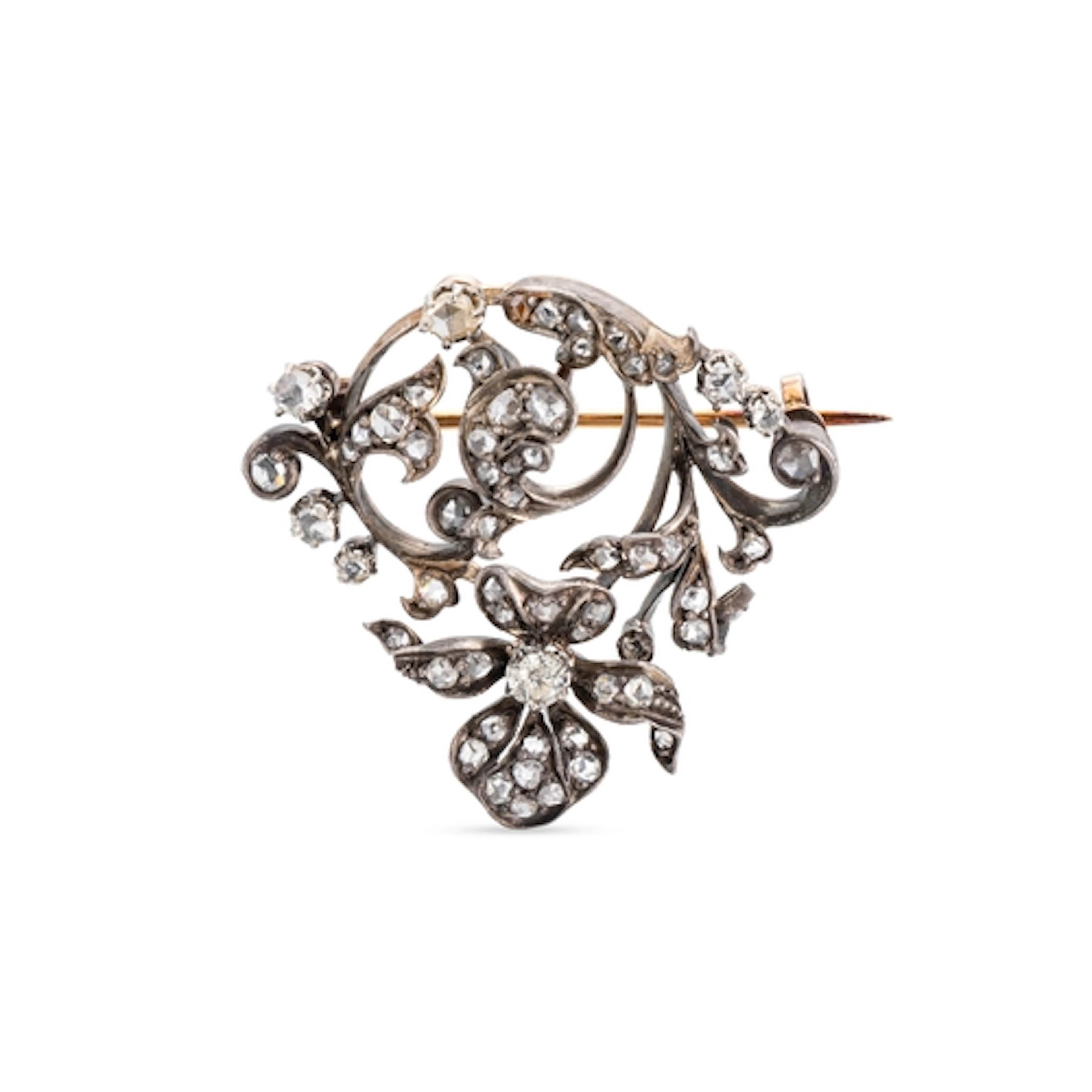 AN ANTIQUE DIAMOND SET BROOCH, set with old cut and rose cut...