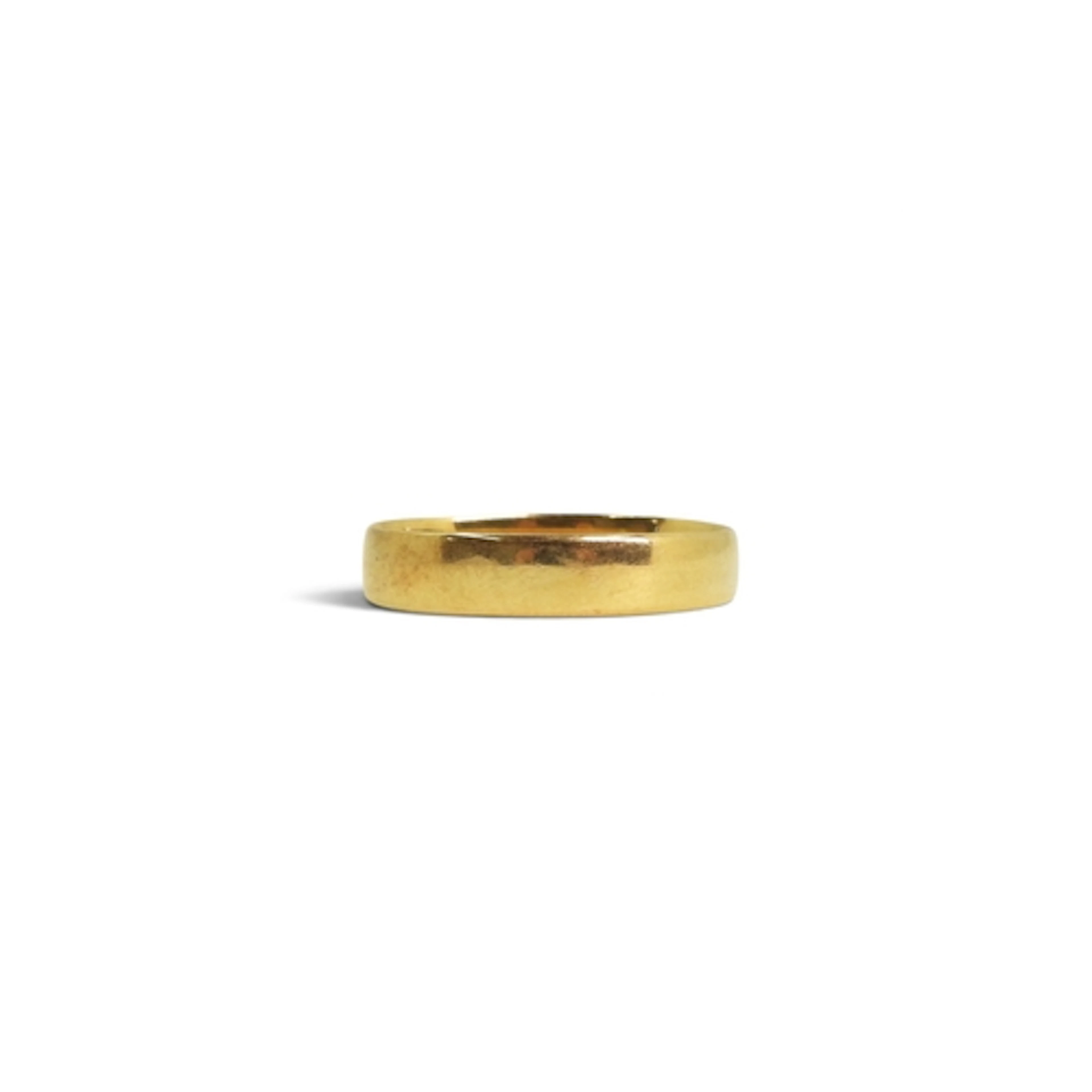An 18ct gold wedding ring, size O, weight 1.6gms. Sold on Be...