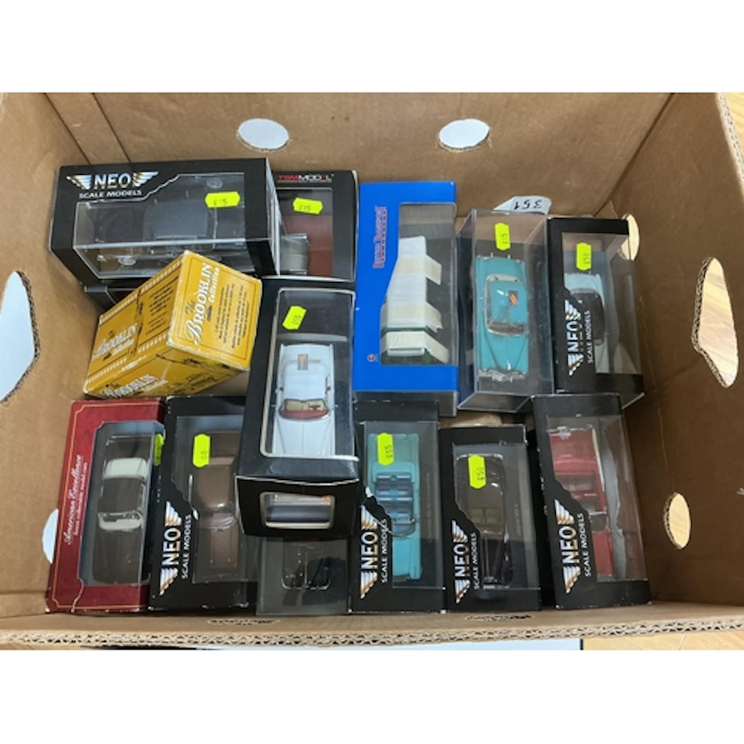 Thirteen boxed 1:43, 1:50 scale, etc. diecast and white meta...
